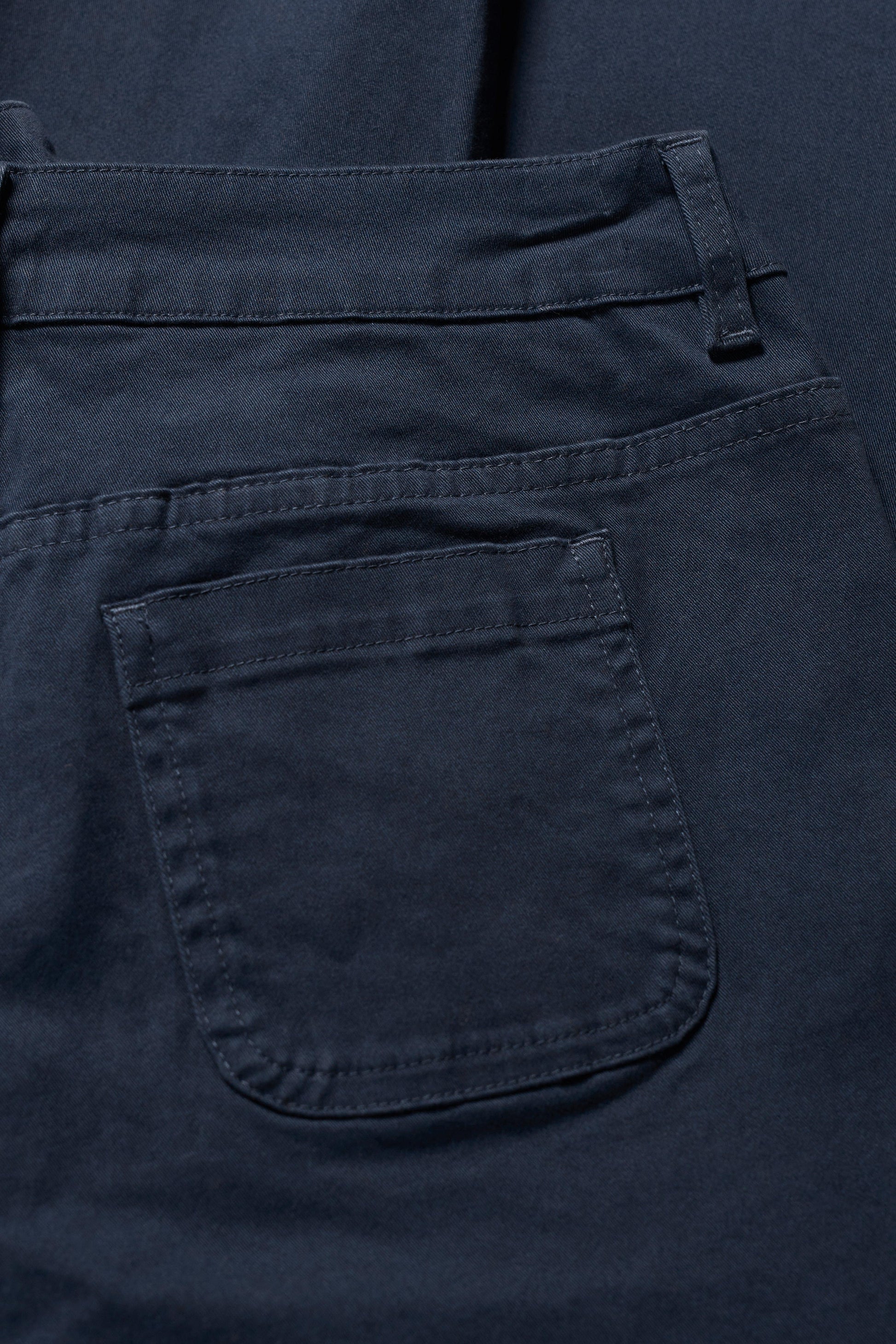 Close-up of a navy pocket on Seasalt trousers