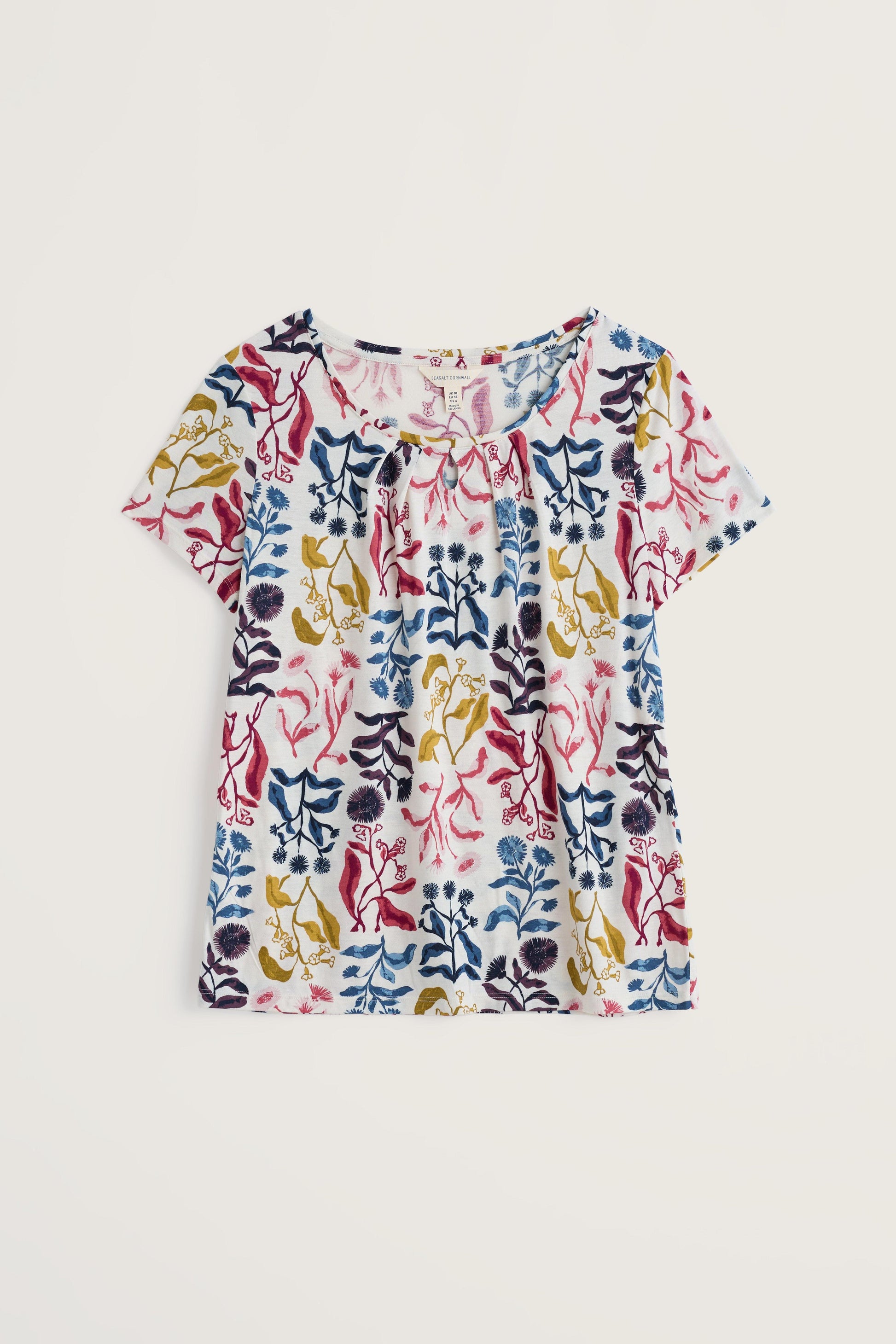 Colourful floral-patterned top on a white background