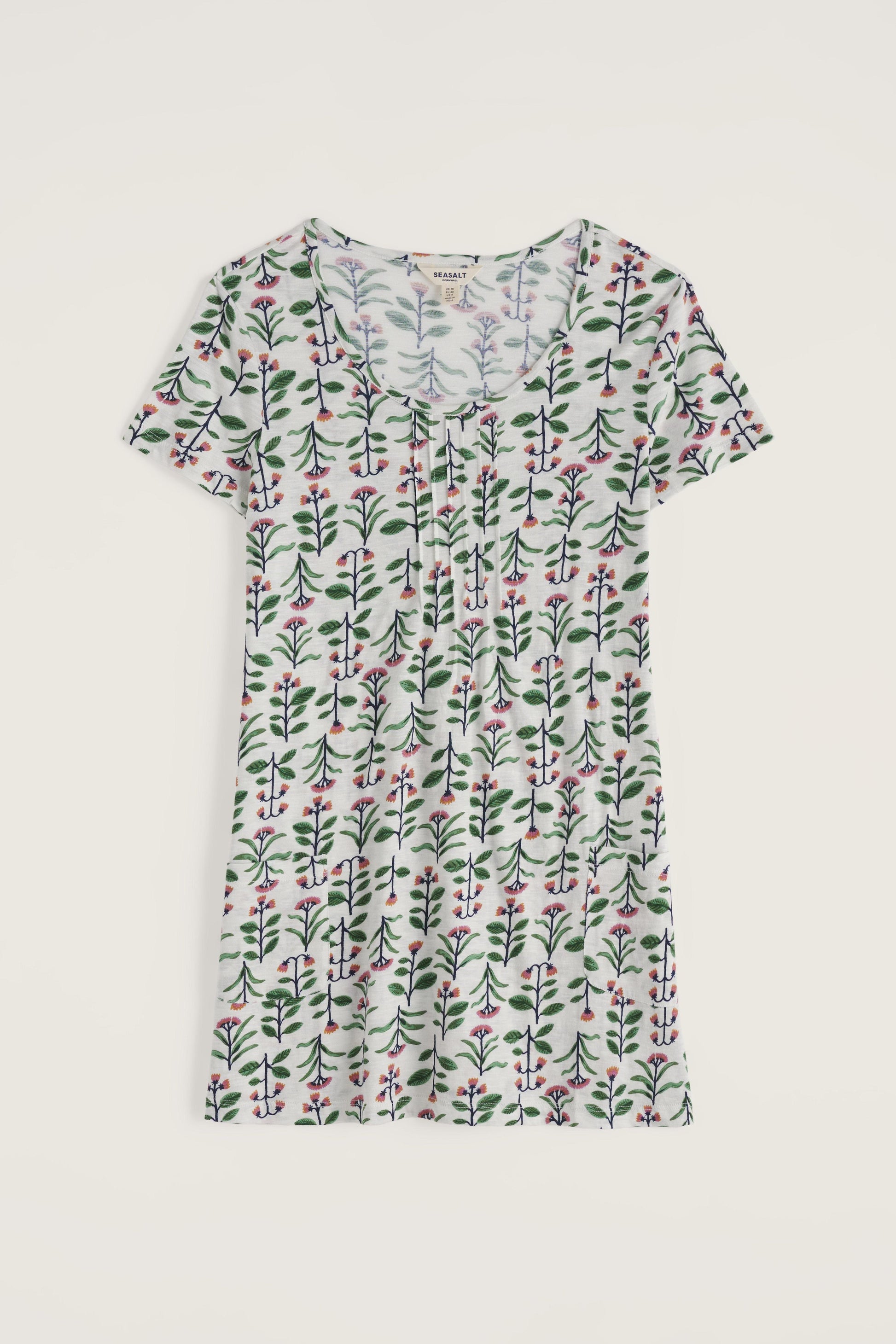 Floral patterned tunic on a light gray background