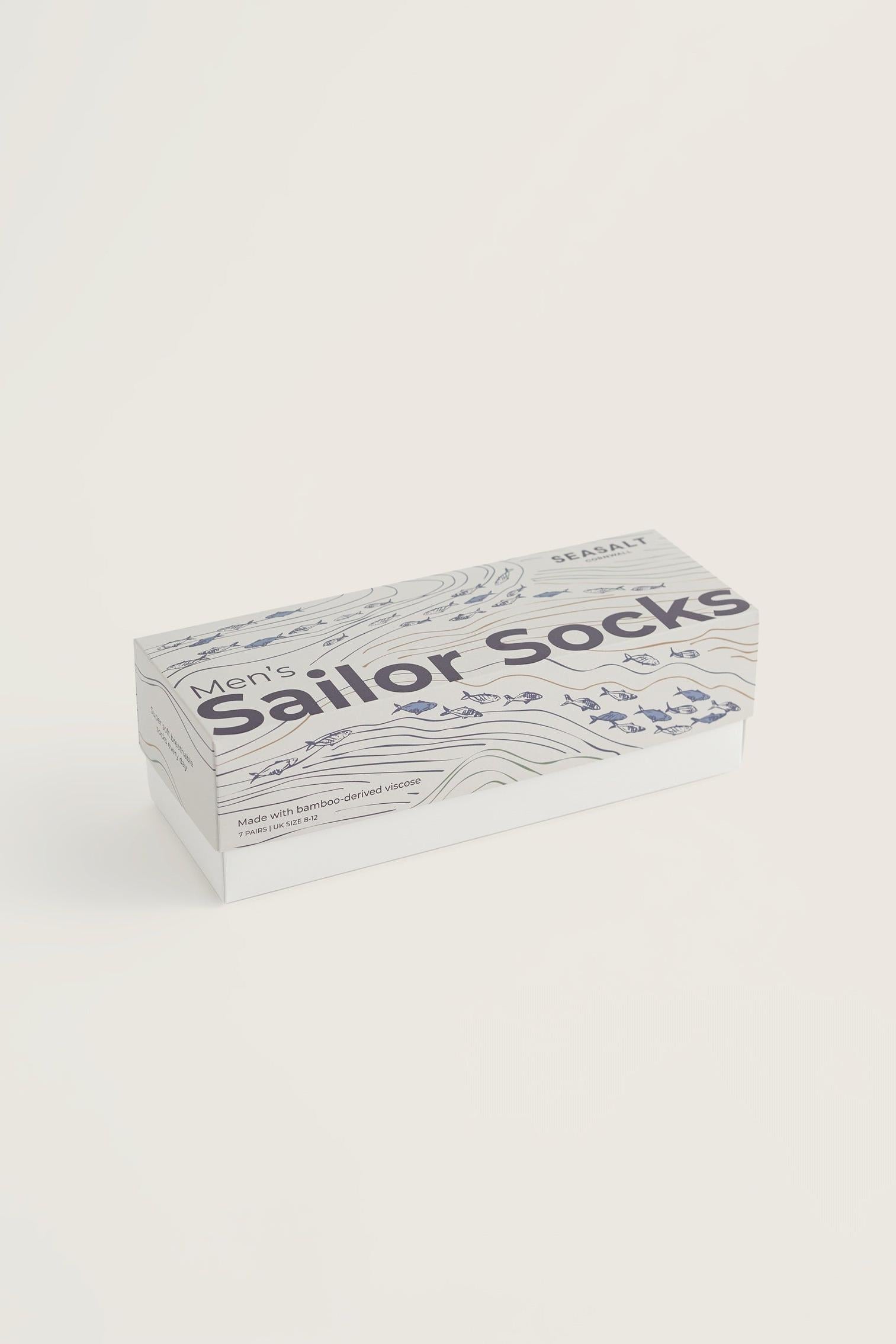 Seasalt Cornwall men's gift box containing sustainable bamboo sailor socks against a neutral background.