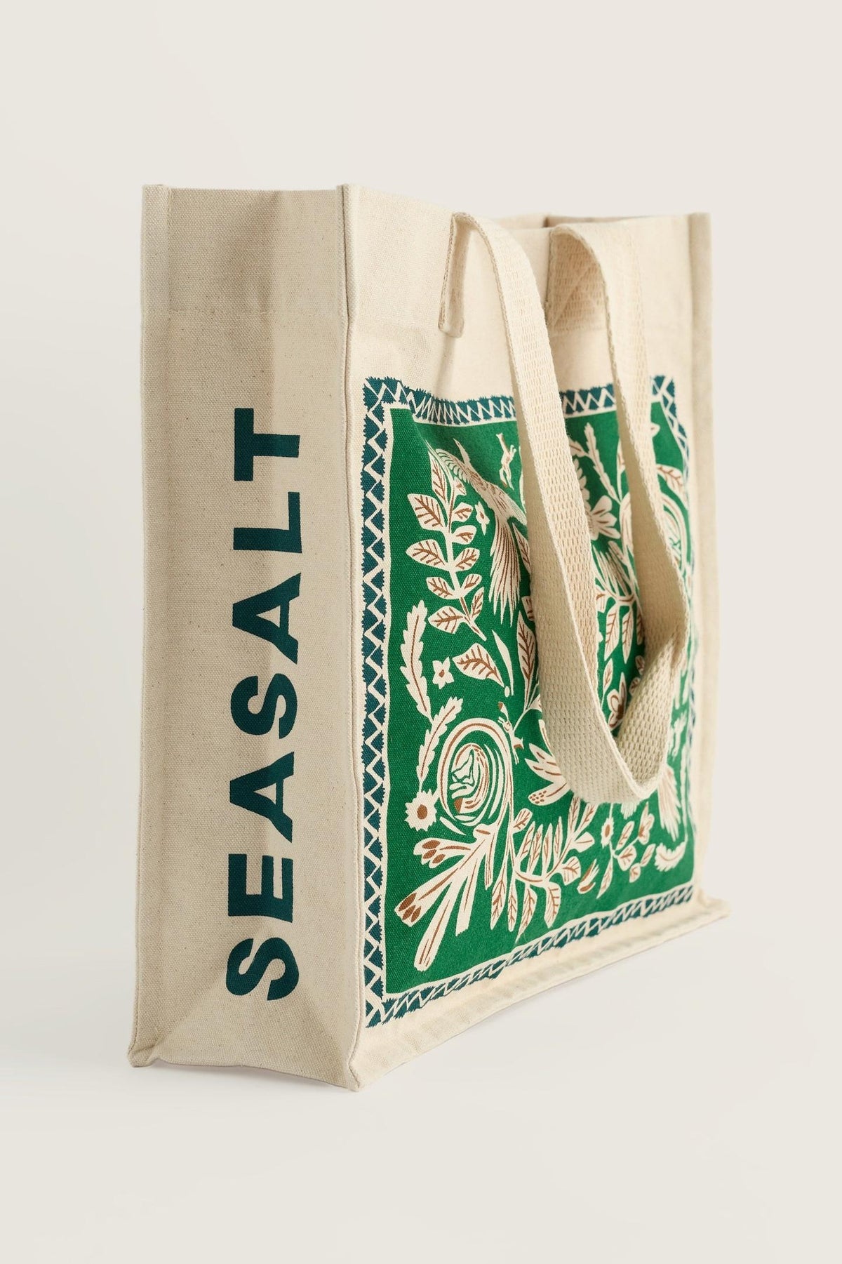 Seasalt Cornwall canvas shopping bag with green botanical print and branded side panel.