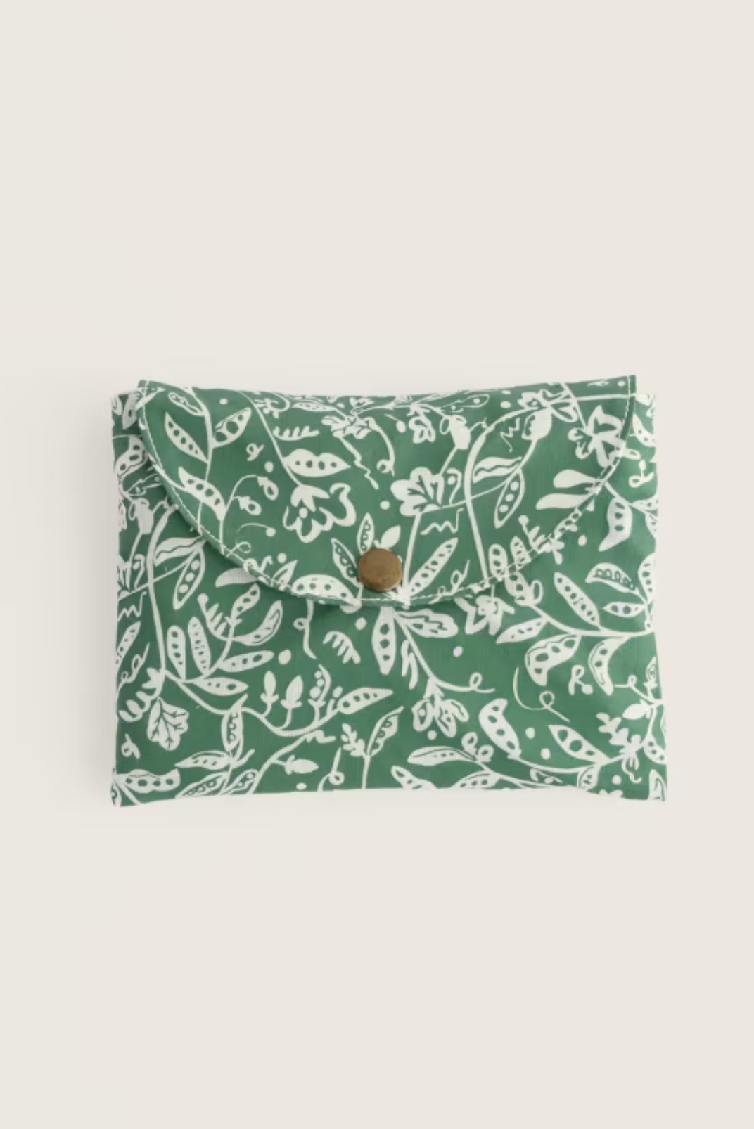 Green Seasalt Cornwall foldaway shopping bag featuring a white botanical floral pattern on a plain background.