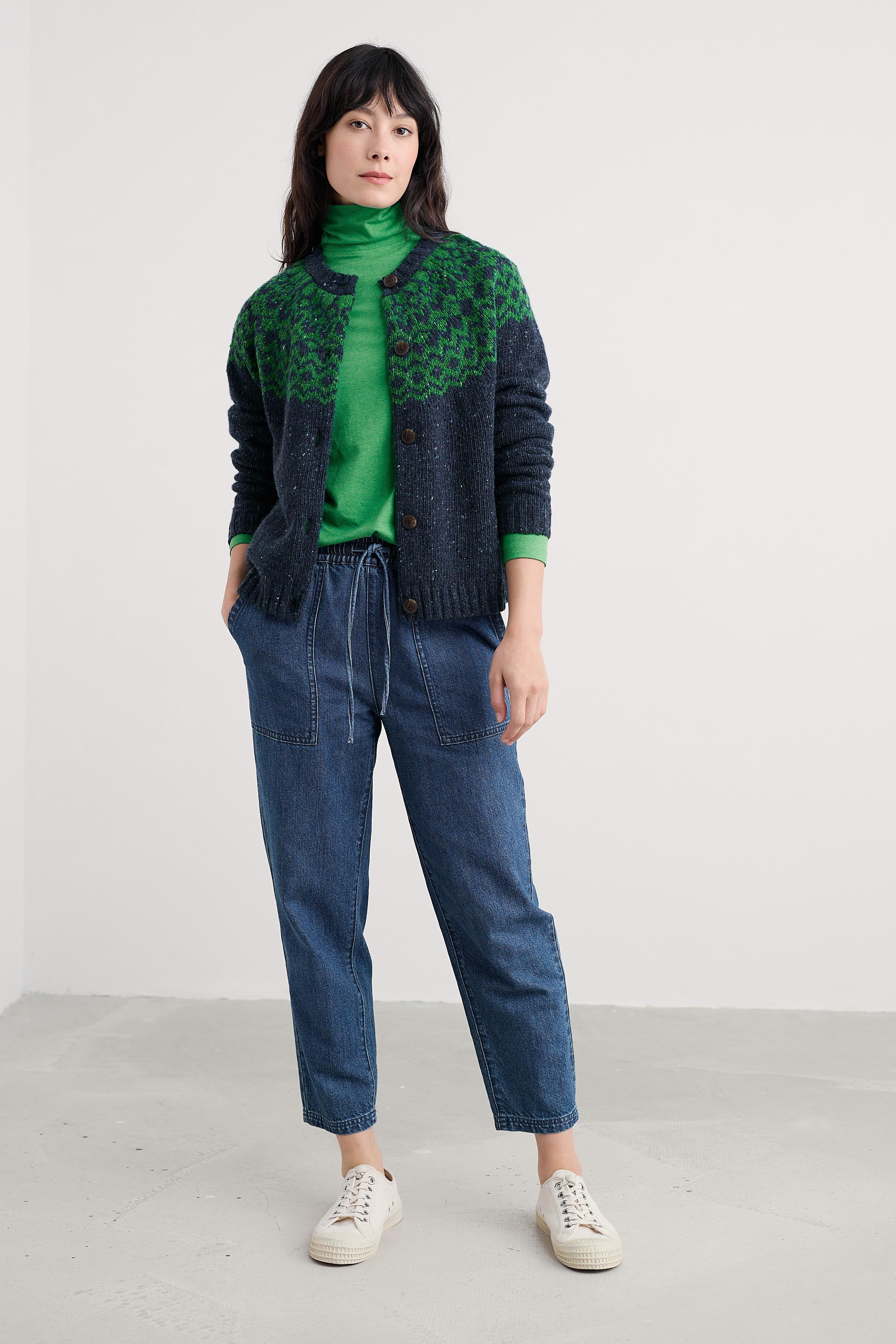 Model styling the Seasalt Landing Top made from sustainable GOTS-certified organic cotton jersey.