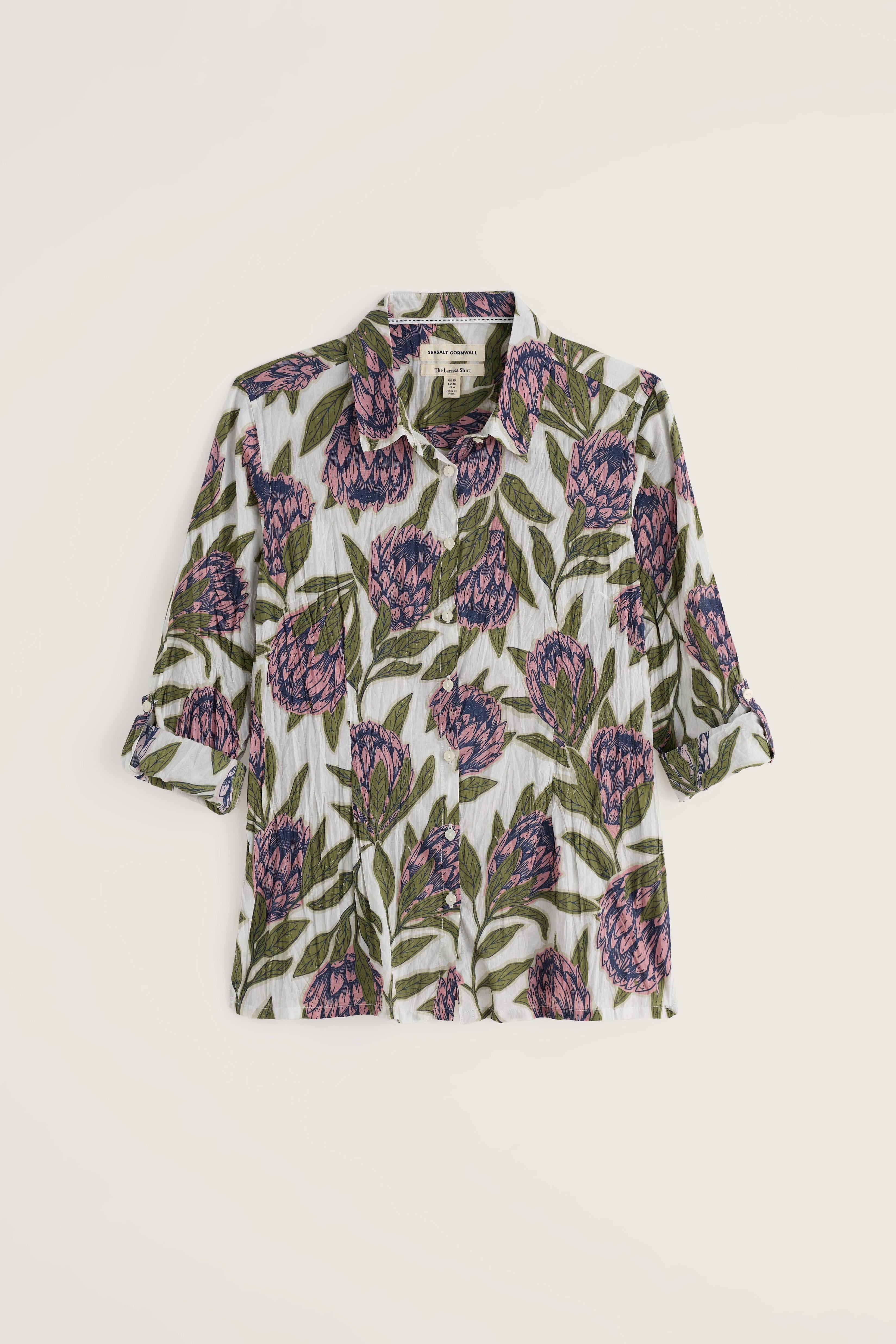 Floral patterned shirt on a light beige background