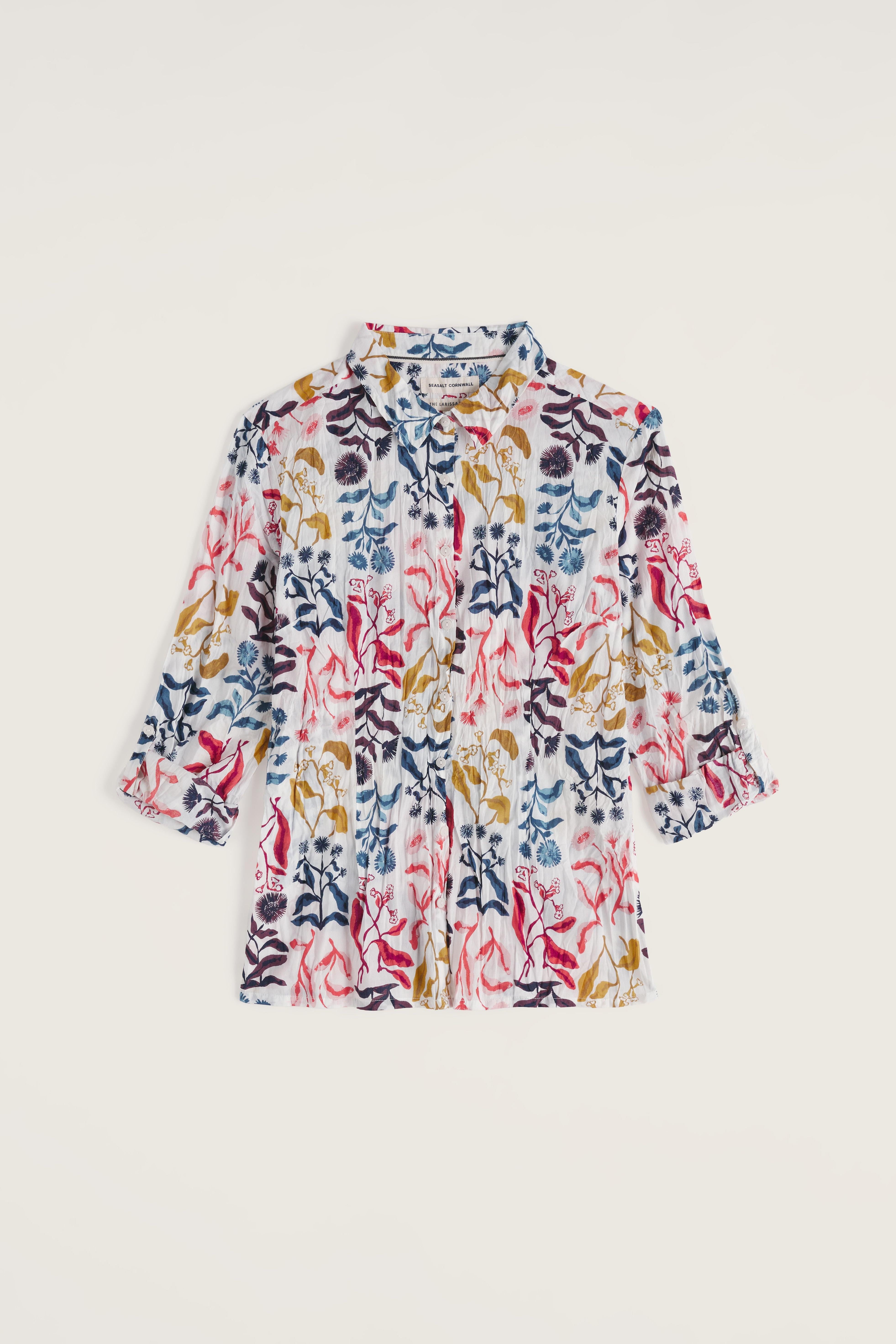 Floral-patterned organic cotton shirt on a beige background