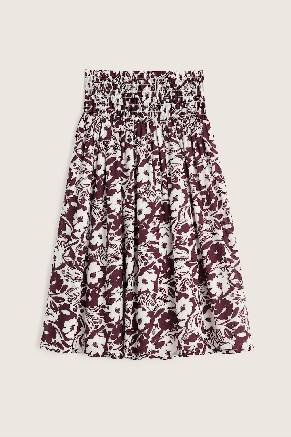 Seasalt organic cotton midi skirt featuring a deep maroon and white floral botanical print with a smocked waistband.