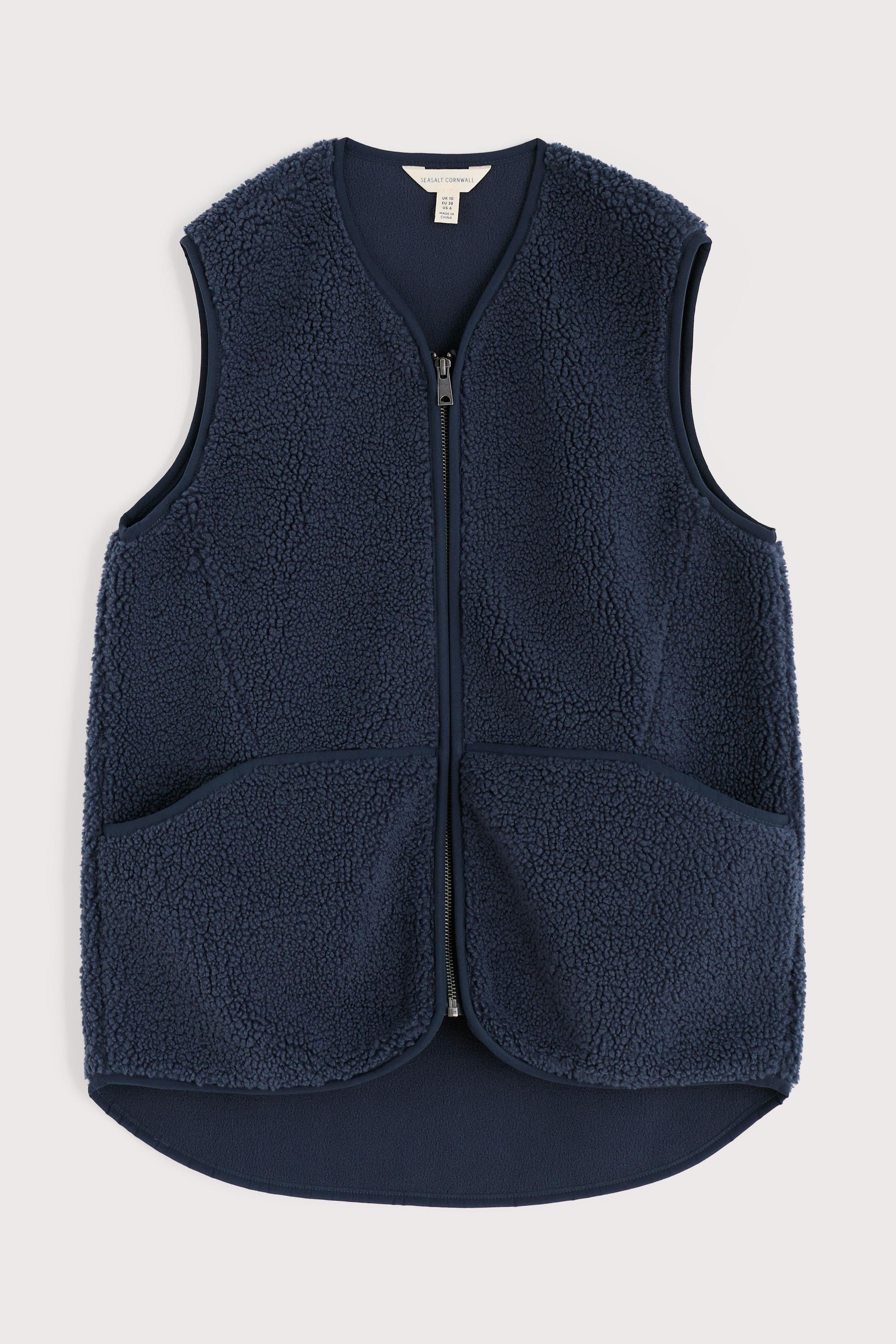 Navy blue fleece vest on a light gray background