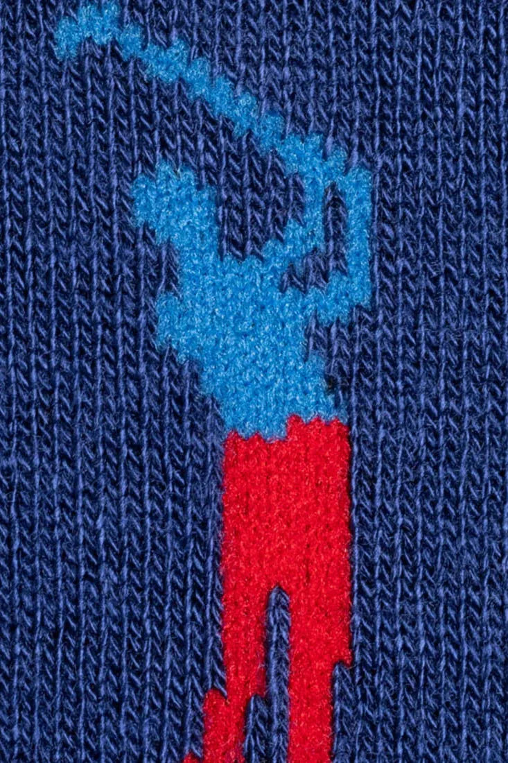 Close-up of a blue and red logo on a textured blue background