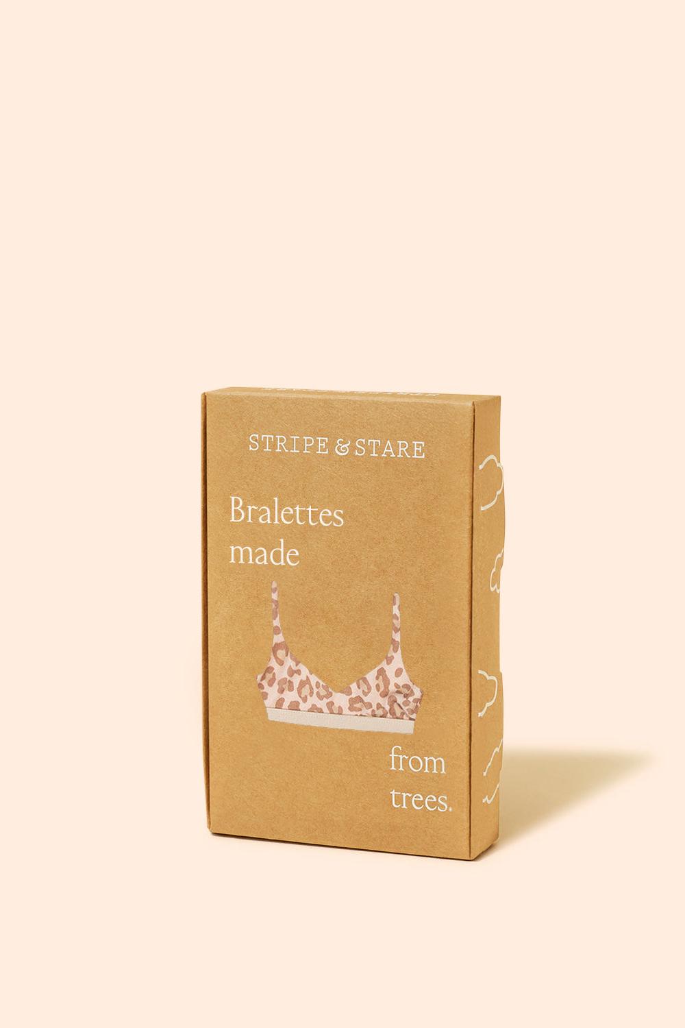 Box of 'Stripe & Stare' bralette made from trees on a beige background