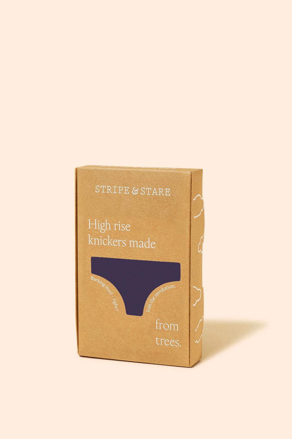 Stripe & Stare branded sustainable gift box containing purple high rise women's underwear against a neutral background.