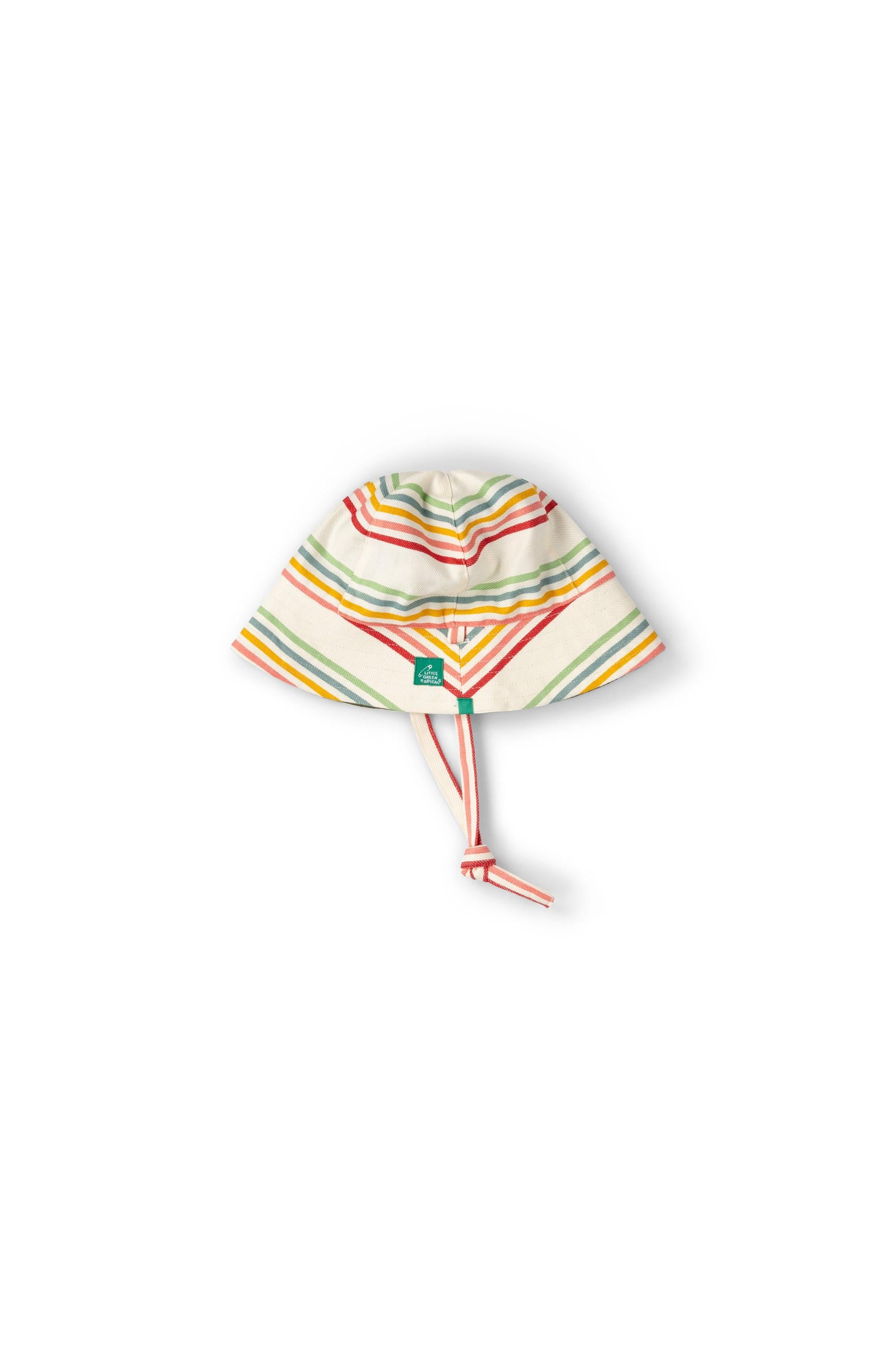 A cream-colored baby sun hat with colorful horizontal stripes and a tie chin strap.