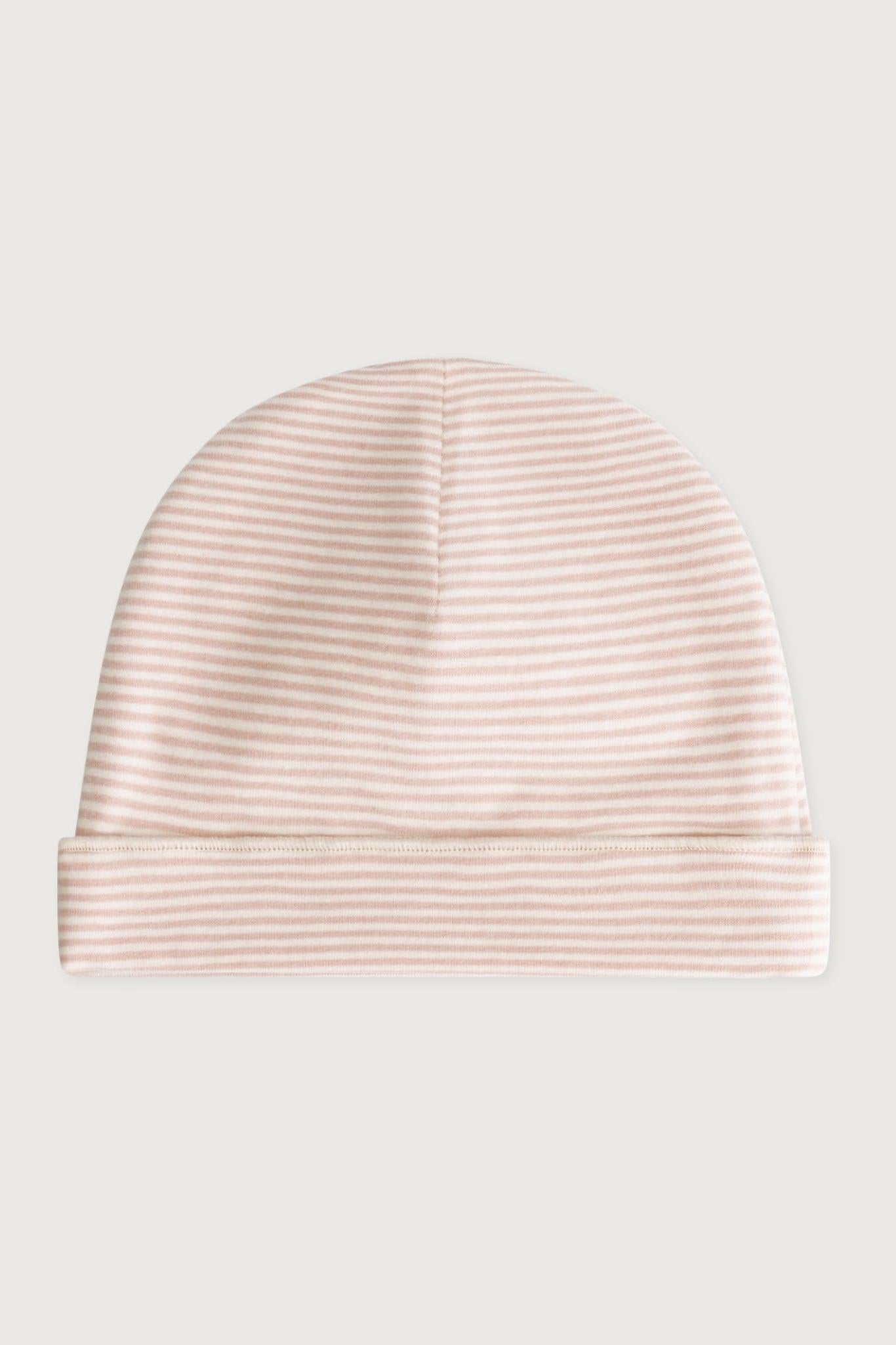 Pink striped baby hat on a light gray background