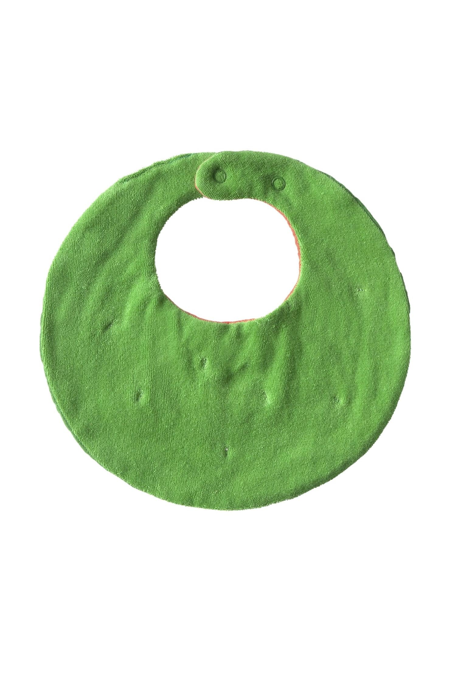 Green organic cotton baby bib on a white background