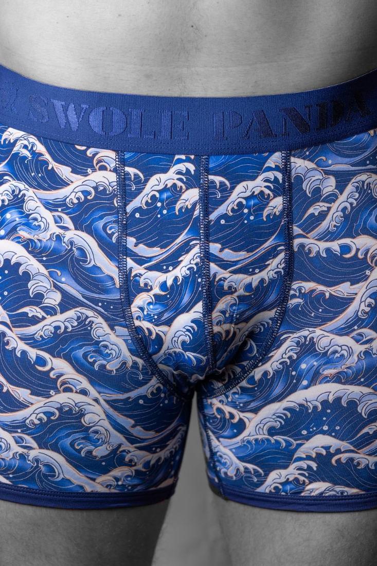 Close up of Swole Panda bamboo boxers featuring a Japanese sea wave pattern worn by a man.