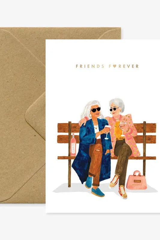 Greeting card with illustration of two women sitting on a bench, wearing sunglasses and holding drinks, with 'Friends Forever' text above.