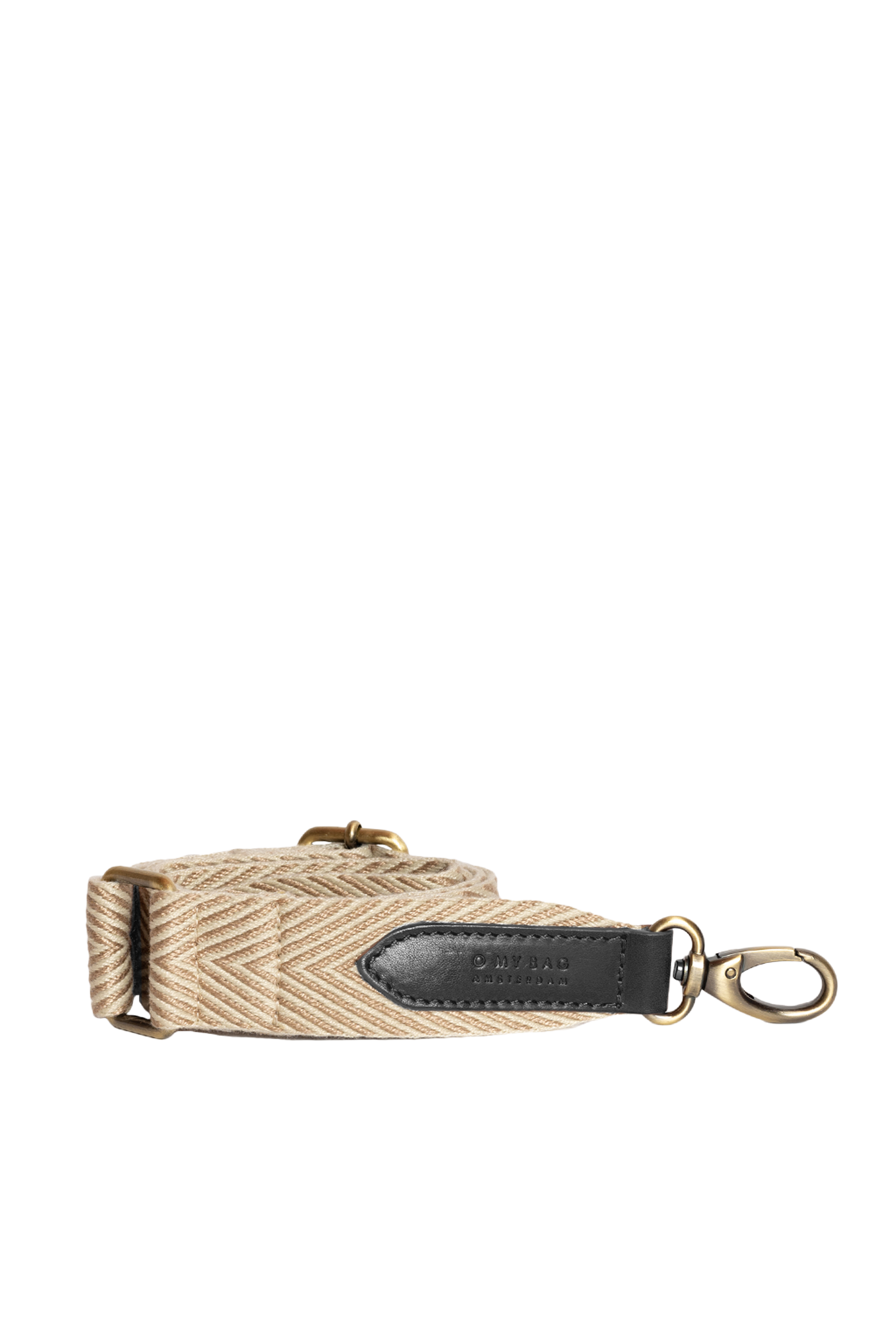 Beige camera strap with black leather tab and gold metal clasp on a white background