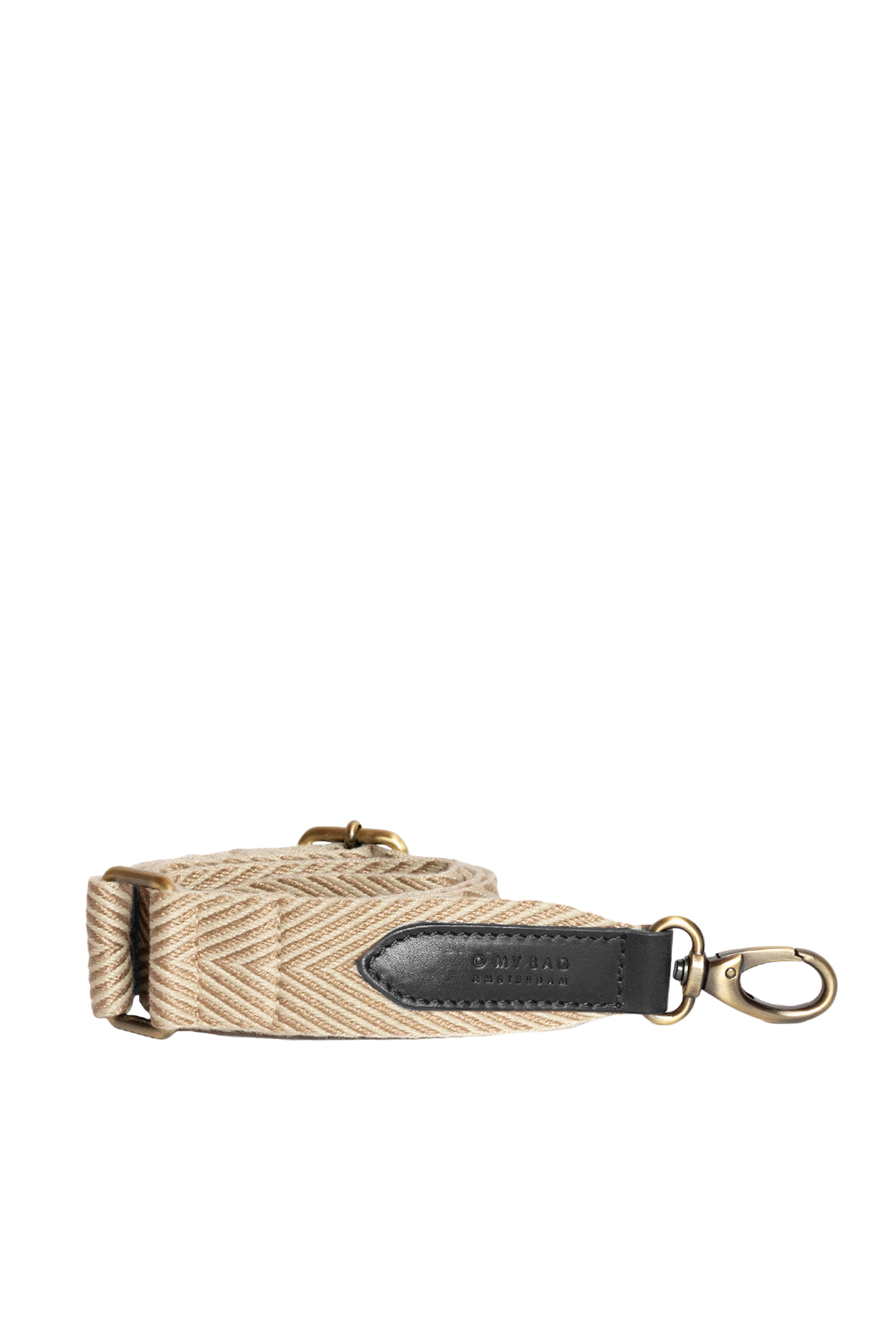 Beige camera strap with black leather tab and gold metal clasp on a white background