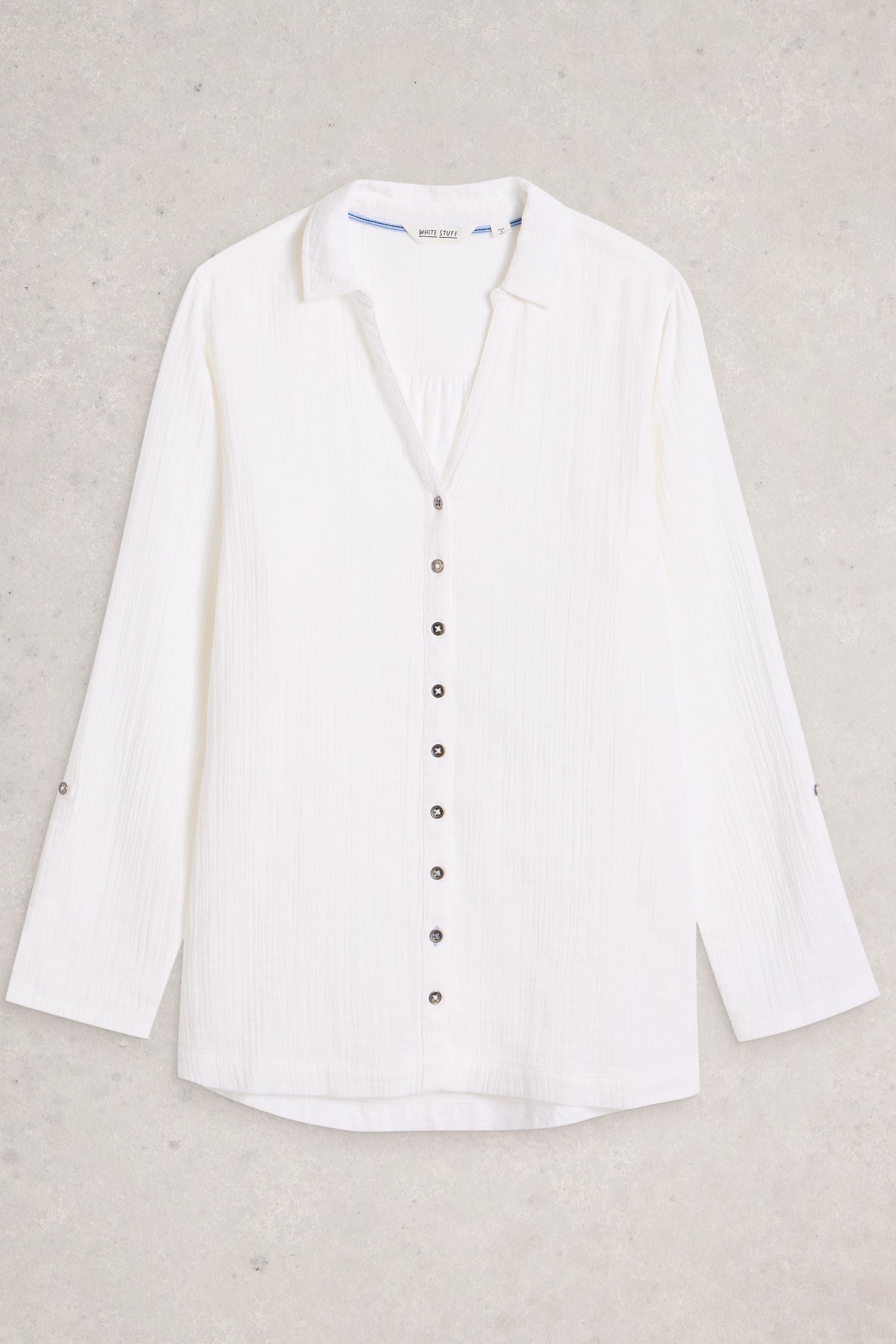 White Stuff blouse with buttons on a light gray background