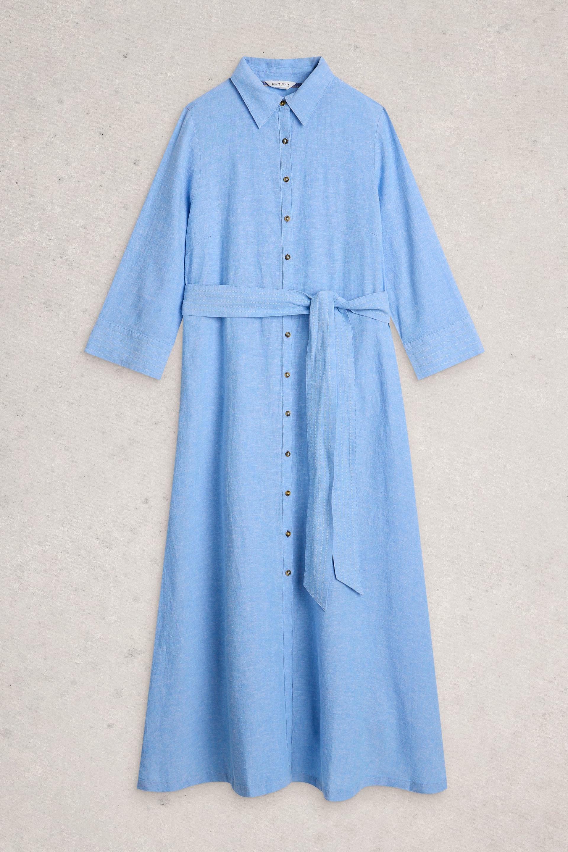 Light blue shirt dress with a belt on a light gray background