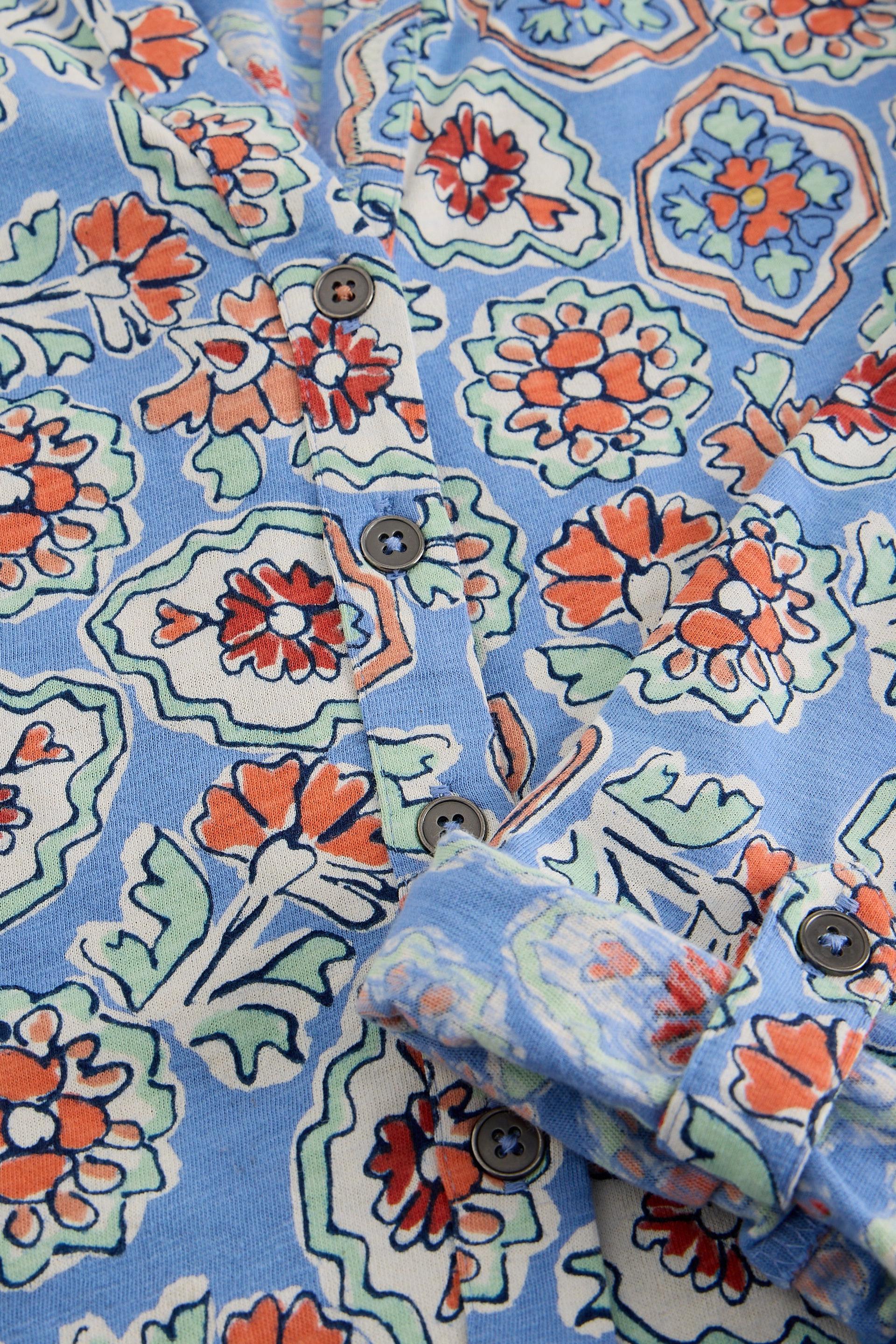 Close-up of White Stuff Annie Shirt with a colourful floral pattern 