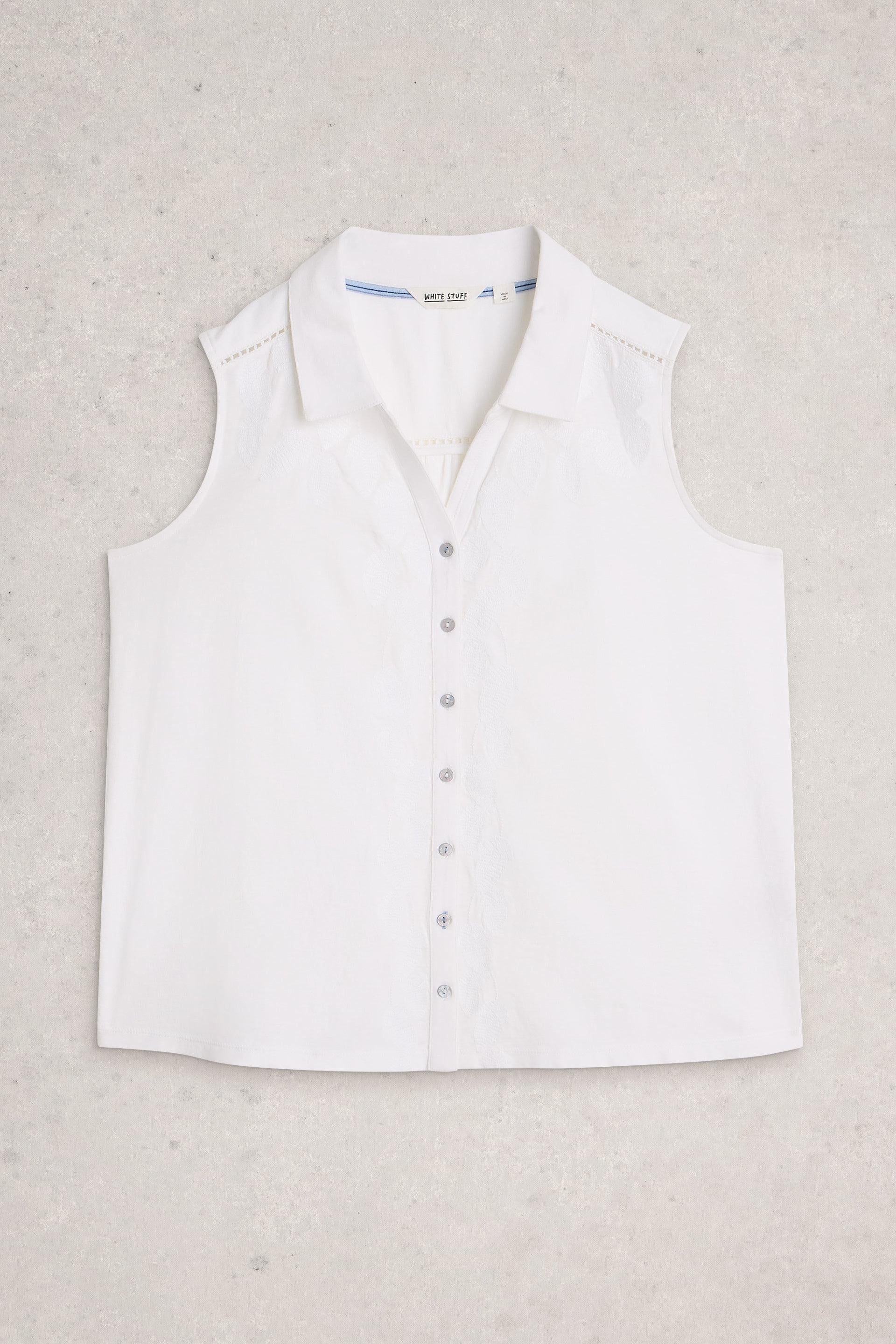 White Stuff sleeveless shirt on a light gray background