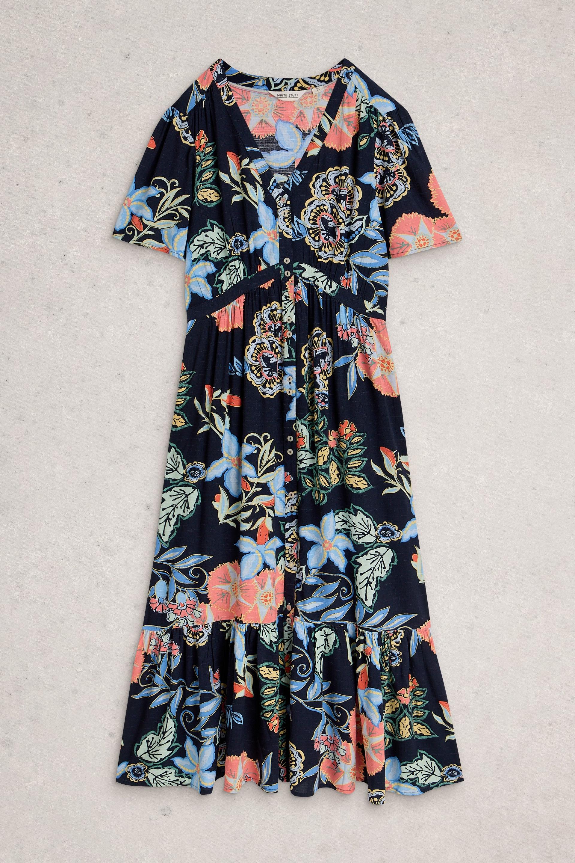 Floral dress with a mix of colors on a light gray background