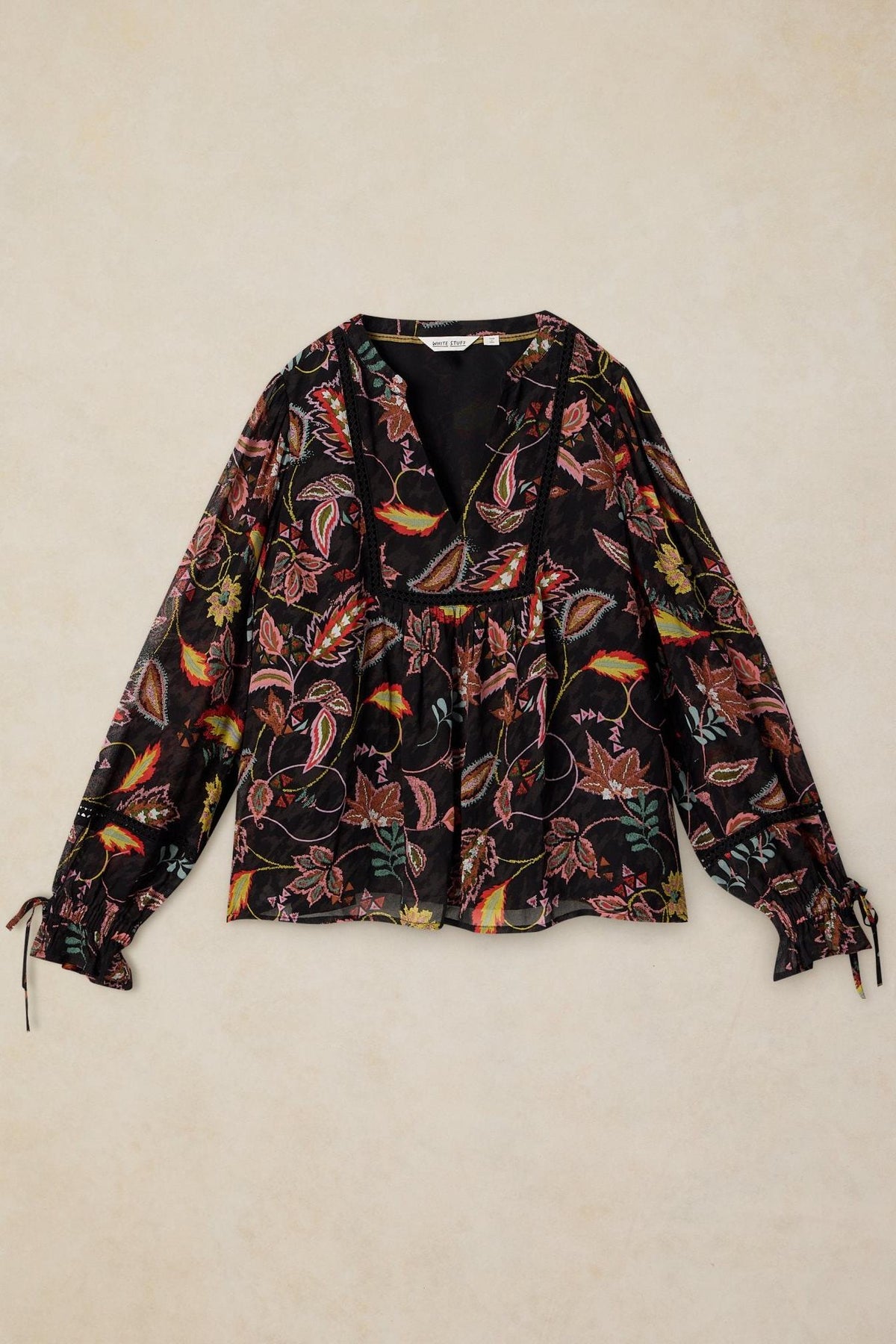 White Stuff black viscose shirt with a vibrant multi-colored floral paisley print and long sleeves.