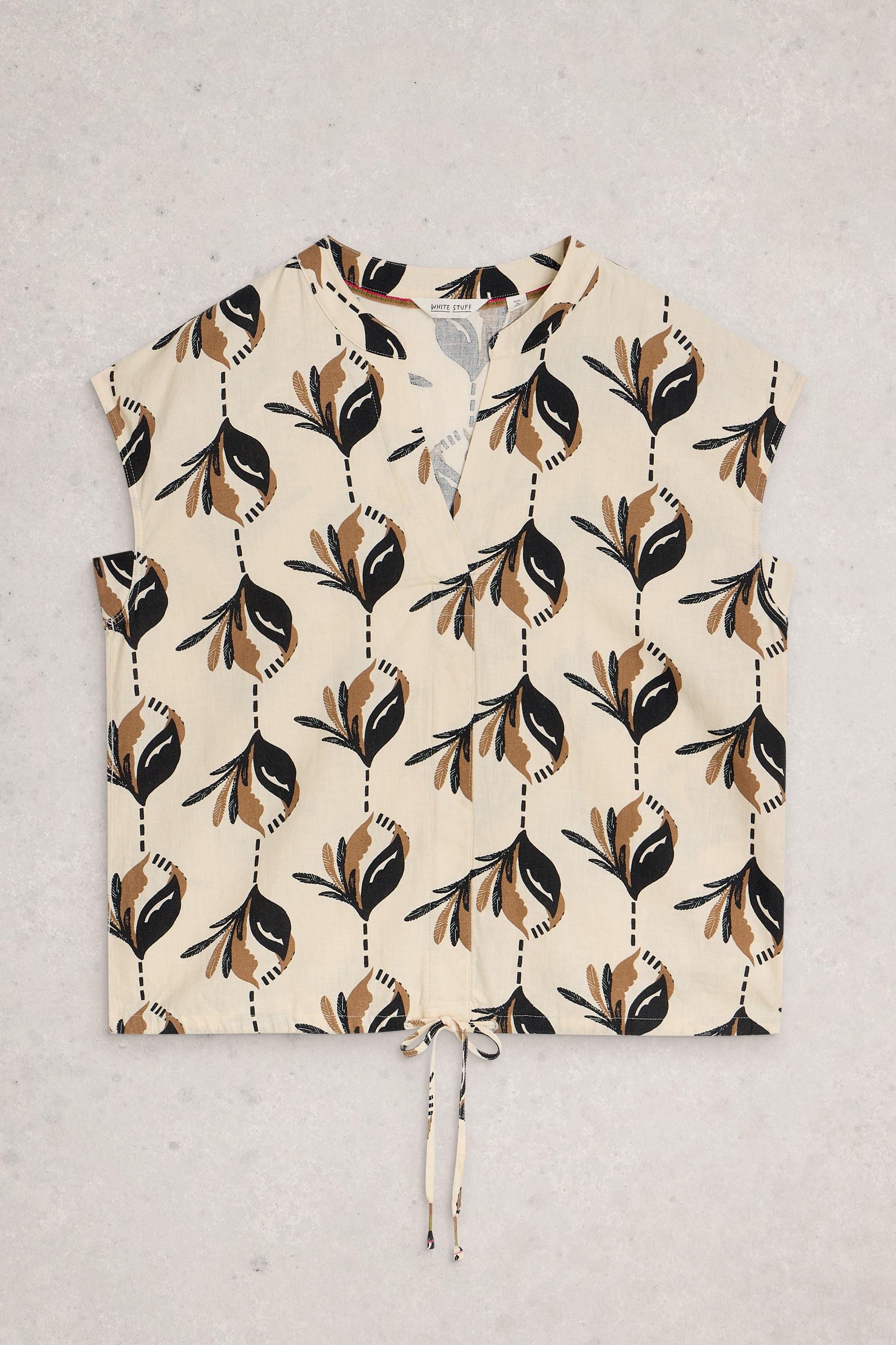 Short-sleeve shirt with leaf pattern and drawstring hem on a light background