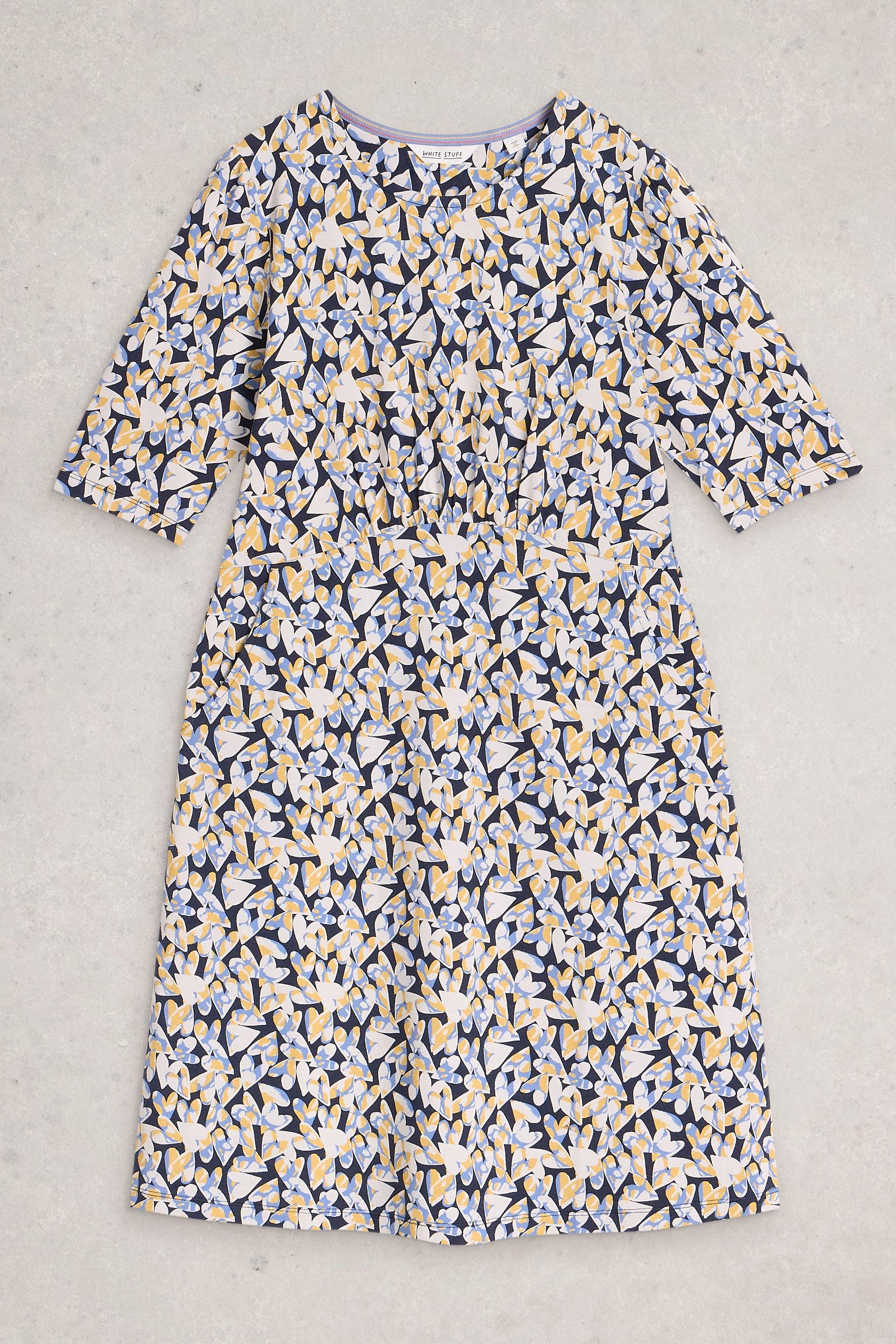 Floral patterned dress on a gray background