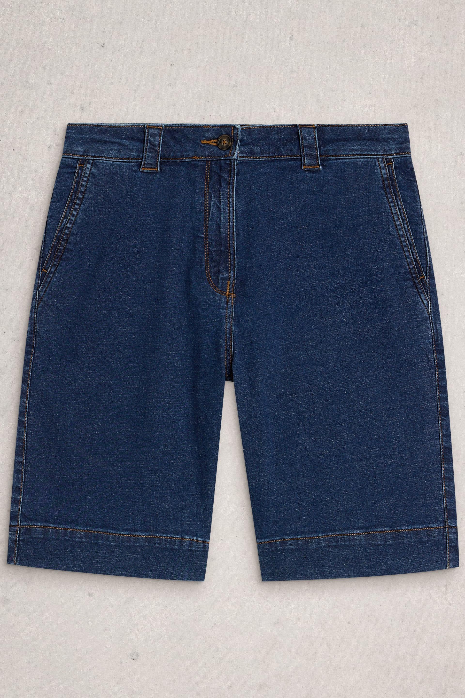 Blue denim organic cotton shorts on a light gray background