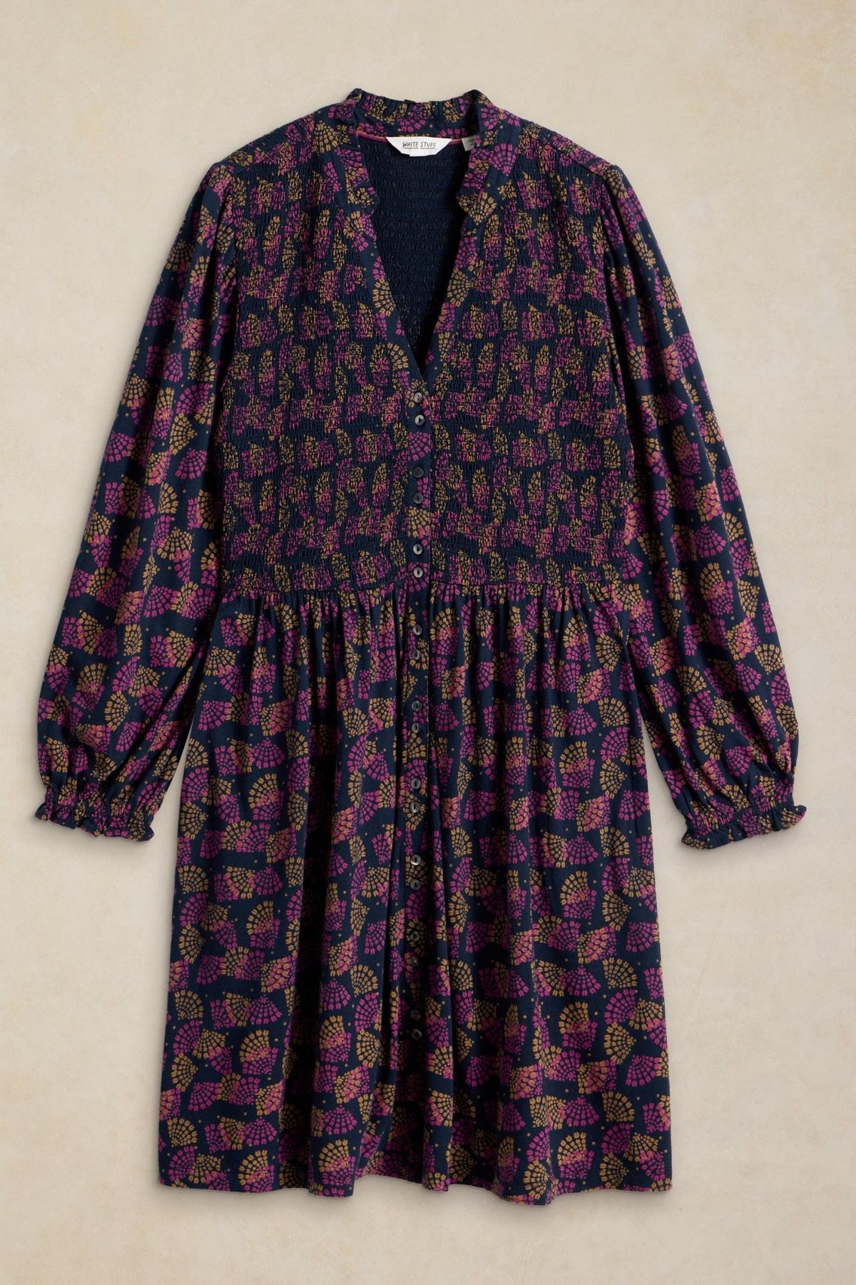 White Stuff knee length everyday dress in a dark floral print made from sustainable fabrics.