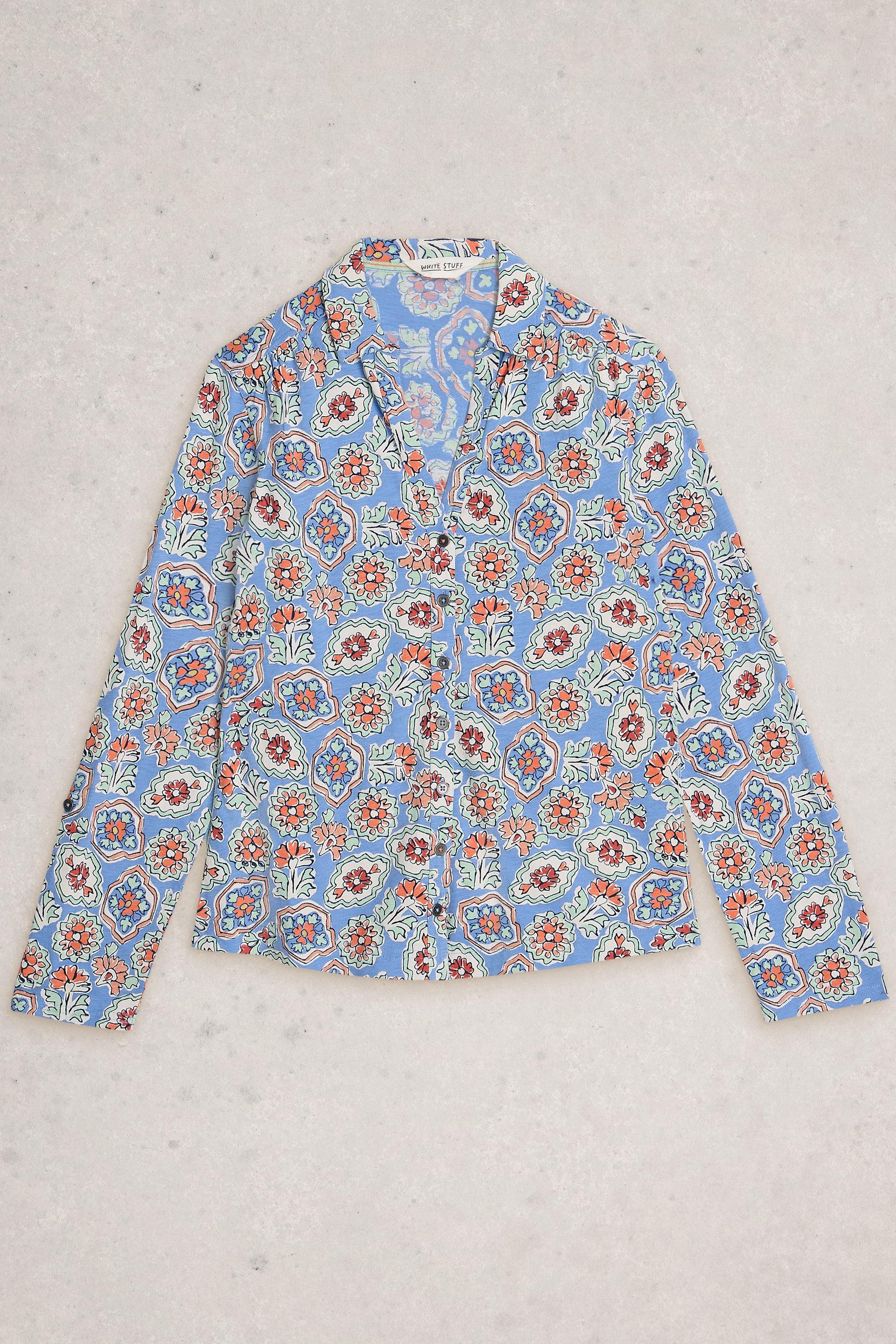 White Stuff floral patterned shirt on a light gray background