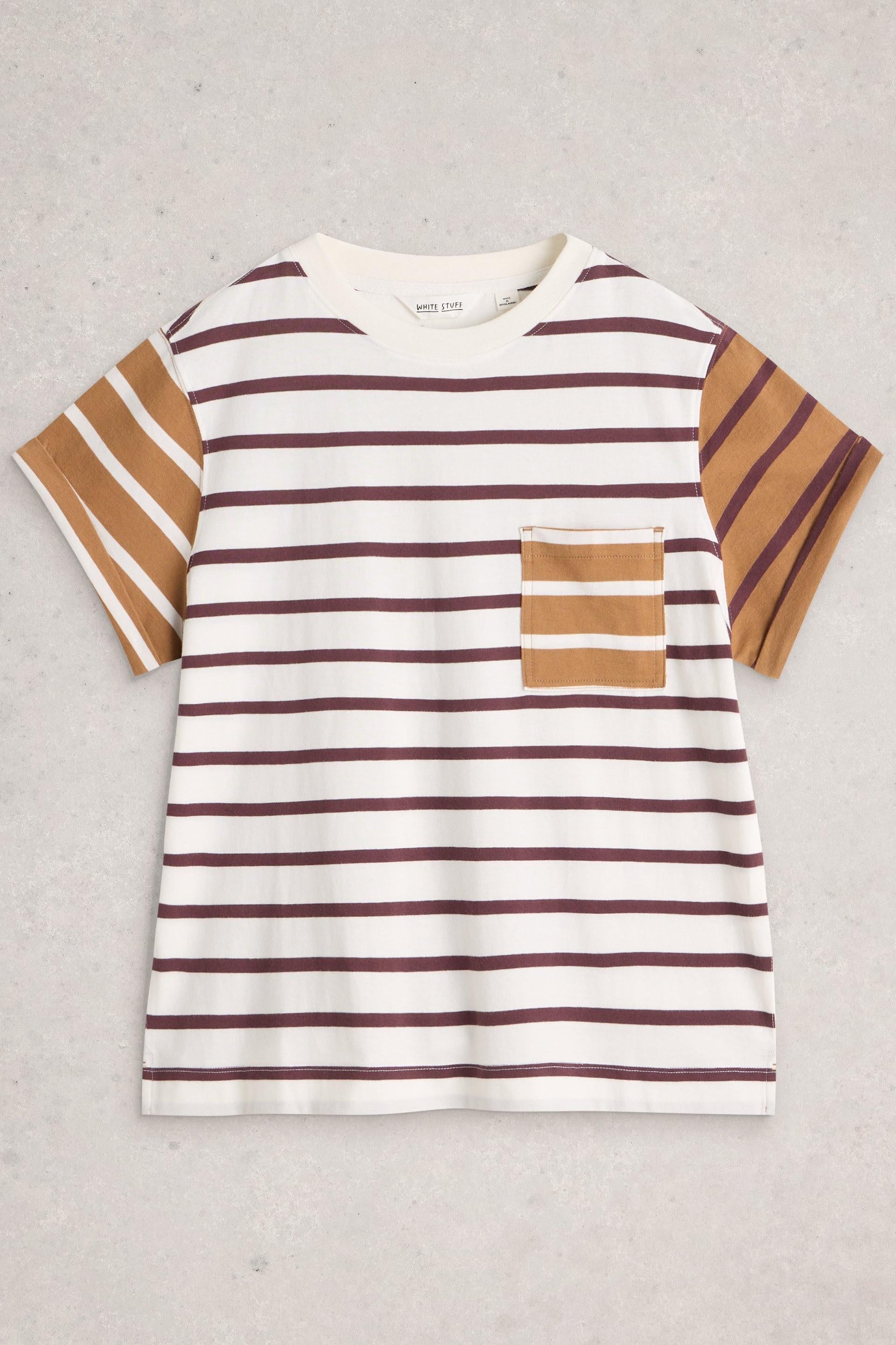 A short-sleeve crewneck t-shirt with horizontal brown and white stripes, featuring solid brown sleeve panels and a matching striped chest pocket, laid flat on a light gray textured background.