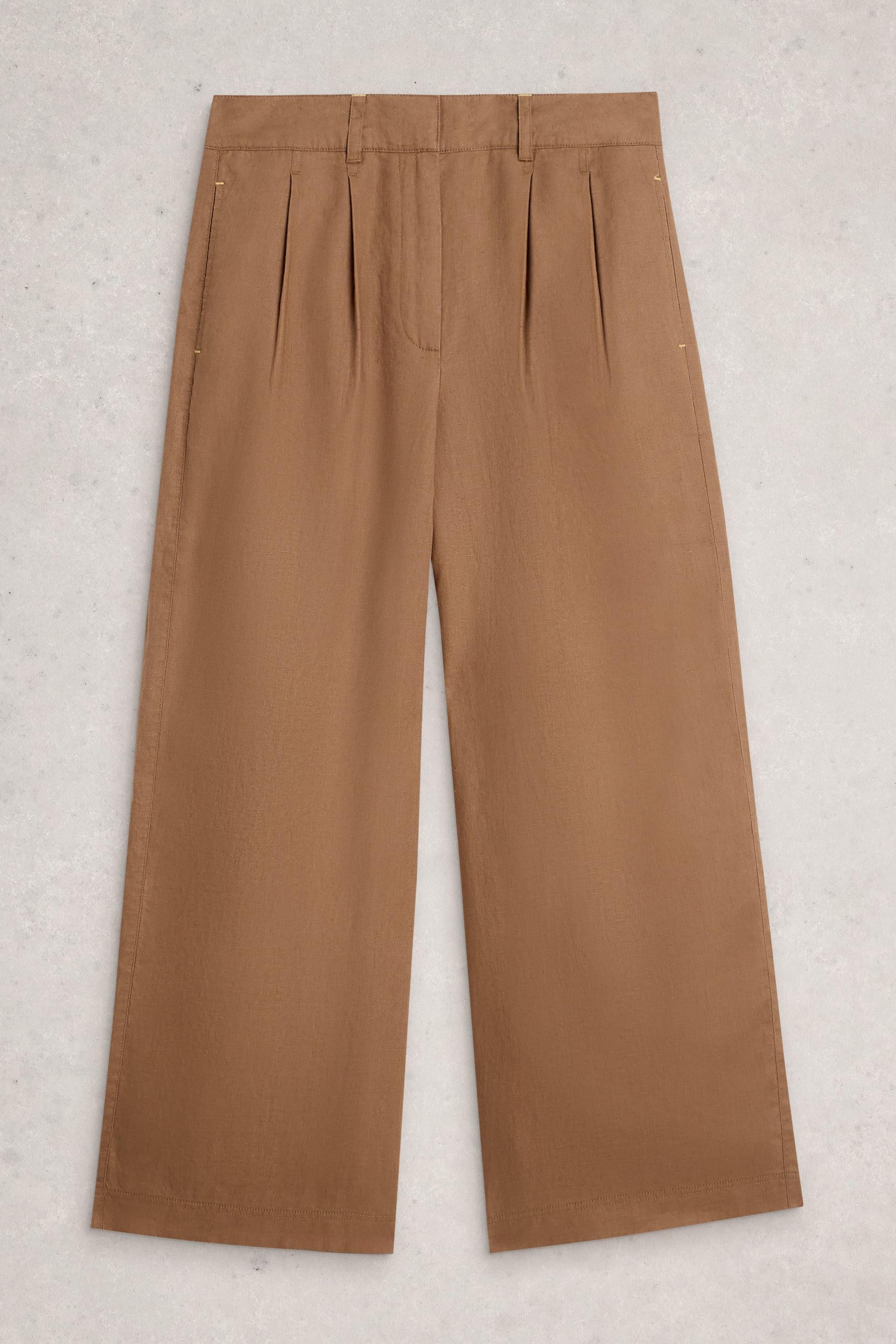Brown wide-leg linen pants on a light gray background