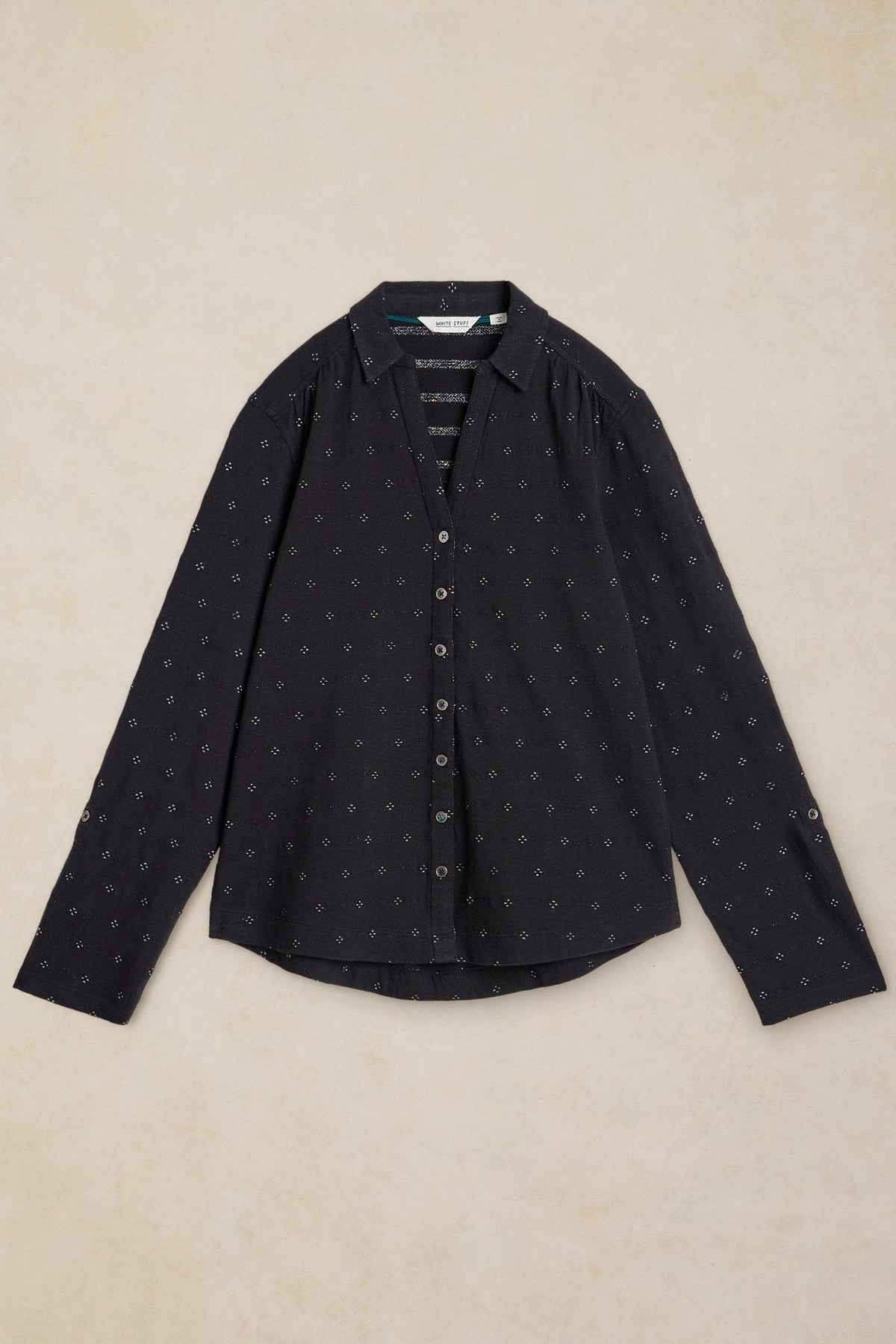 A black cotton women's shirt by White Stuff featuring a subtle sparkle pattern and button-down front.