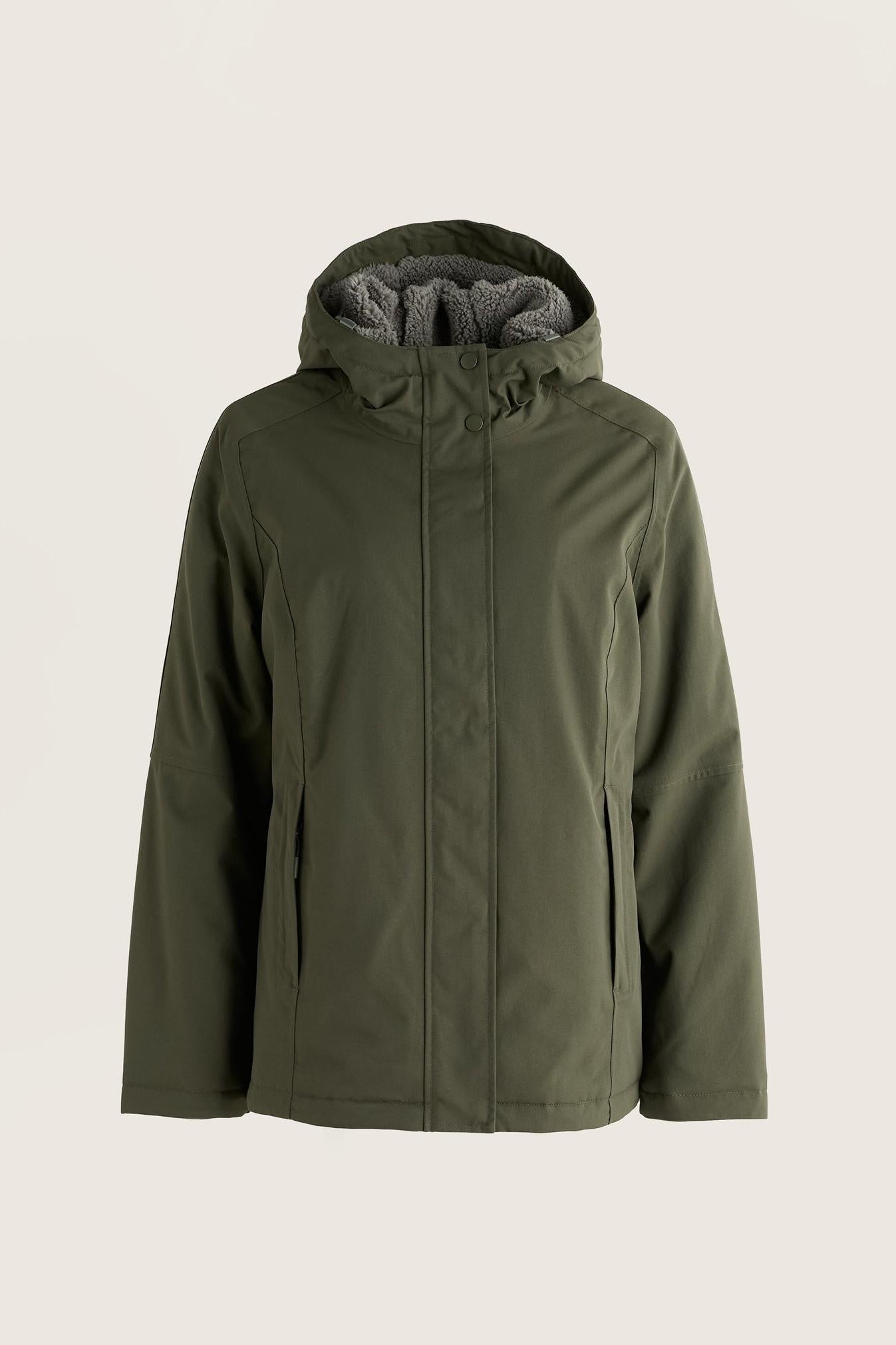 Seasalt Cornwall woodland green women's waterproof jacket with fleece-lined hood on a plain background.