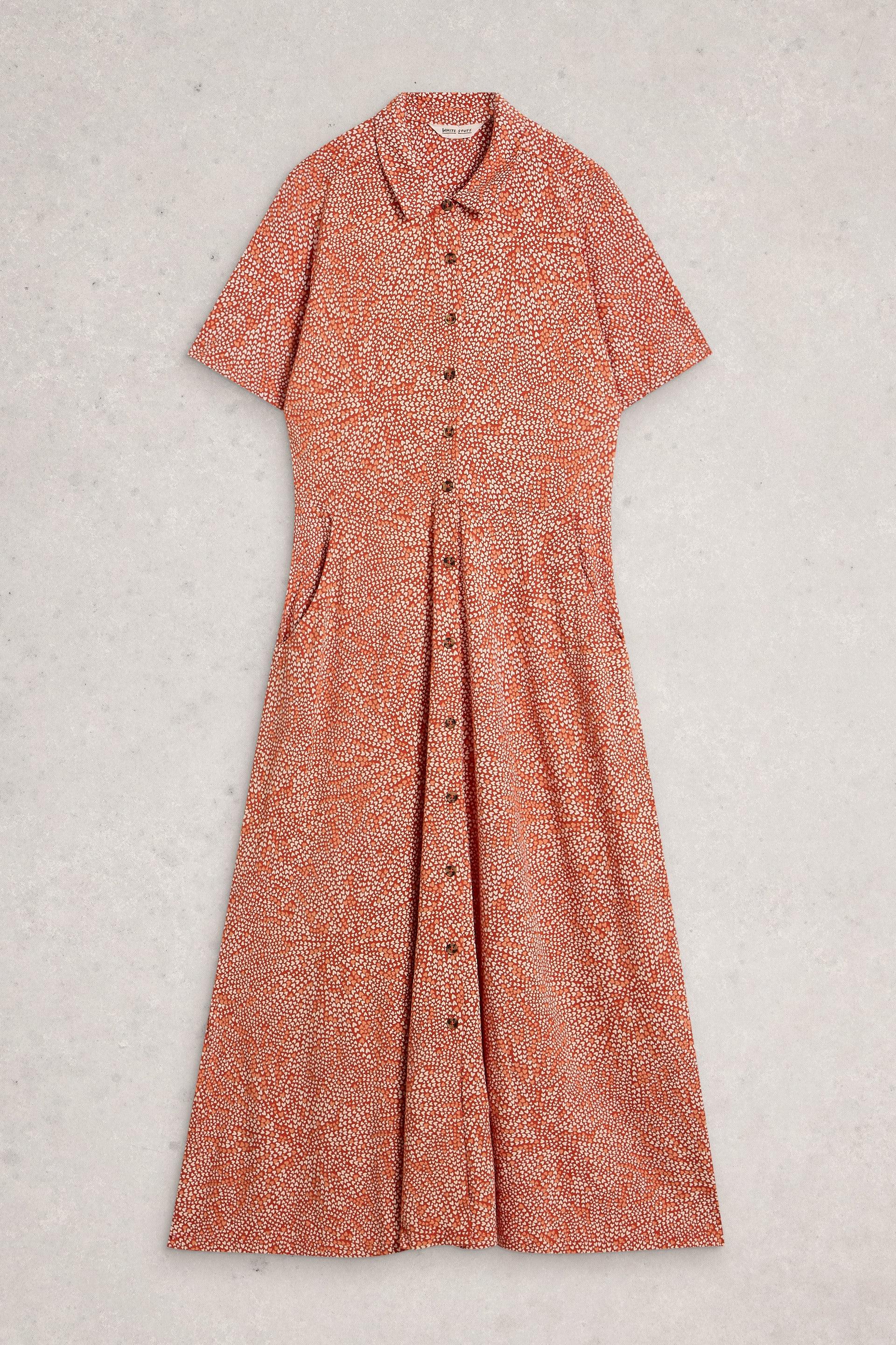 Red organic cotton midi dress on a light gray background