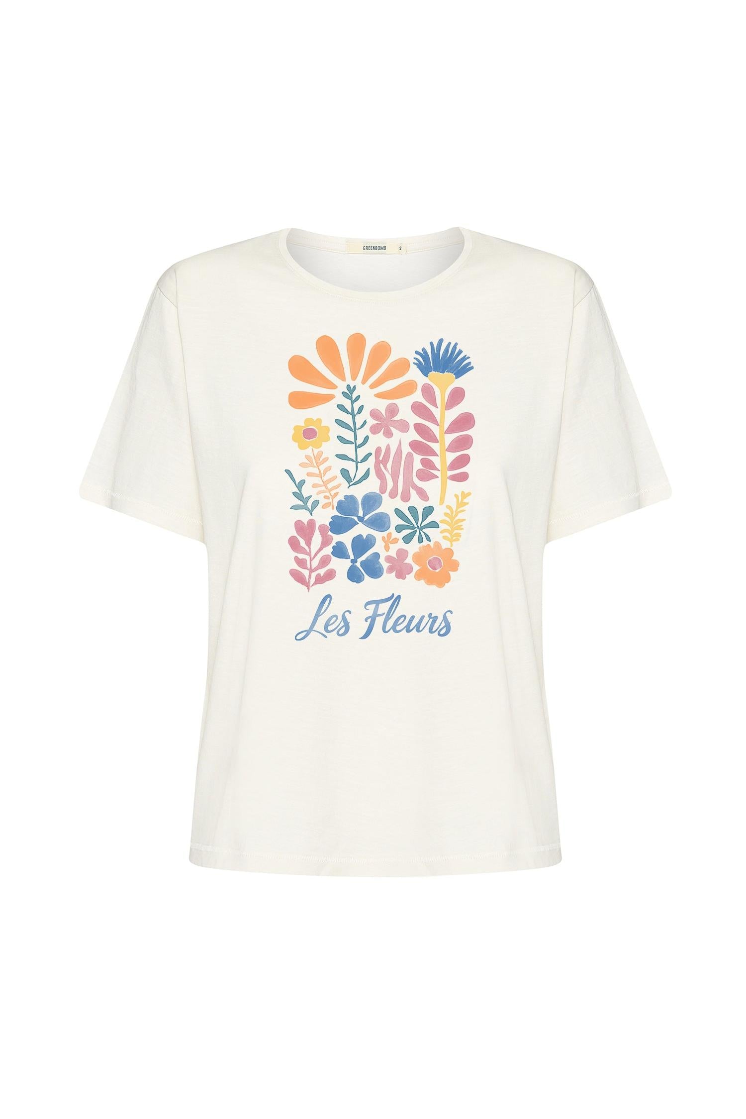 A white t-shirt with colourful floral design and 'les fleurs' writing on a white background