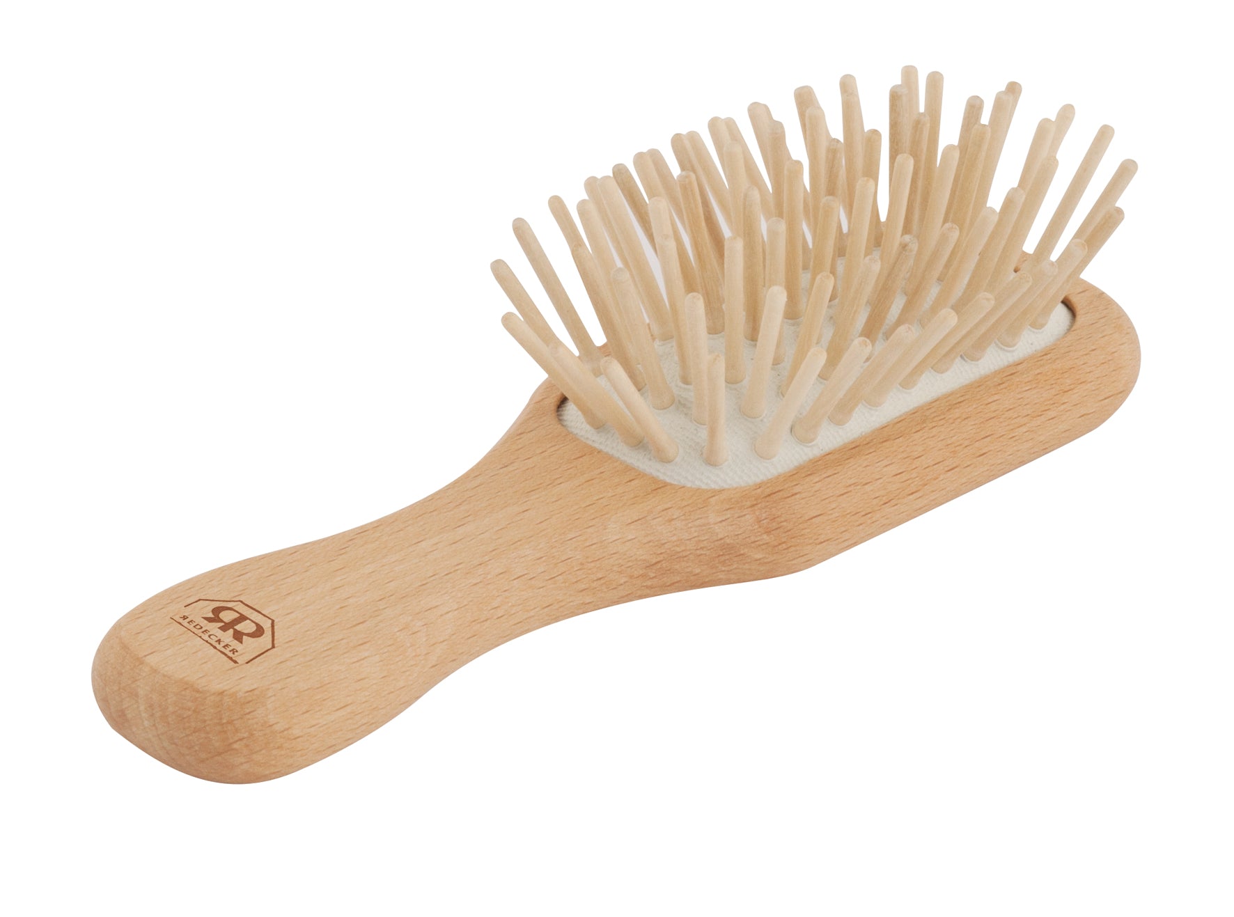 Wooden hairbrush with bristles on a white background