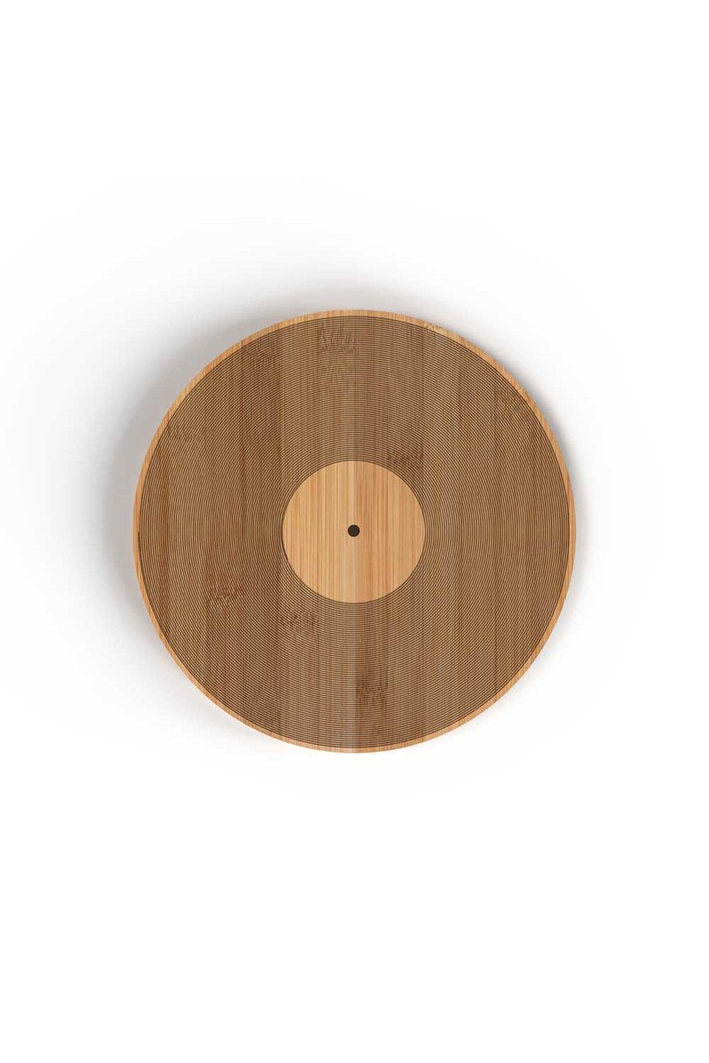 A round cutting board with a natural bamboo wood grain design, featuring a central light wood circle with a single black dot at its center, shown against a plain white background.