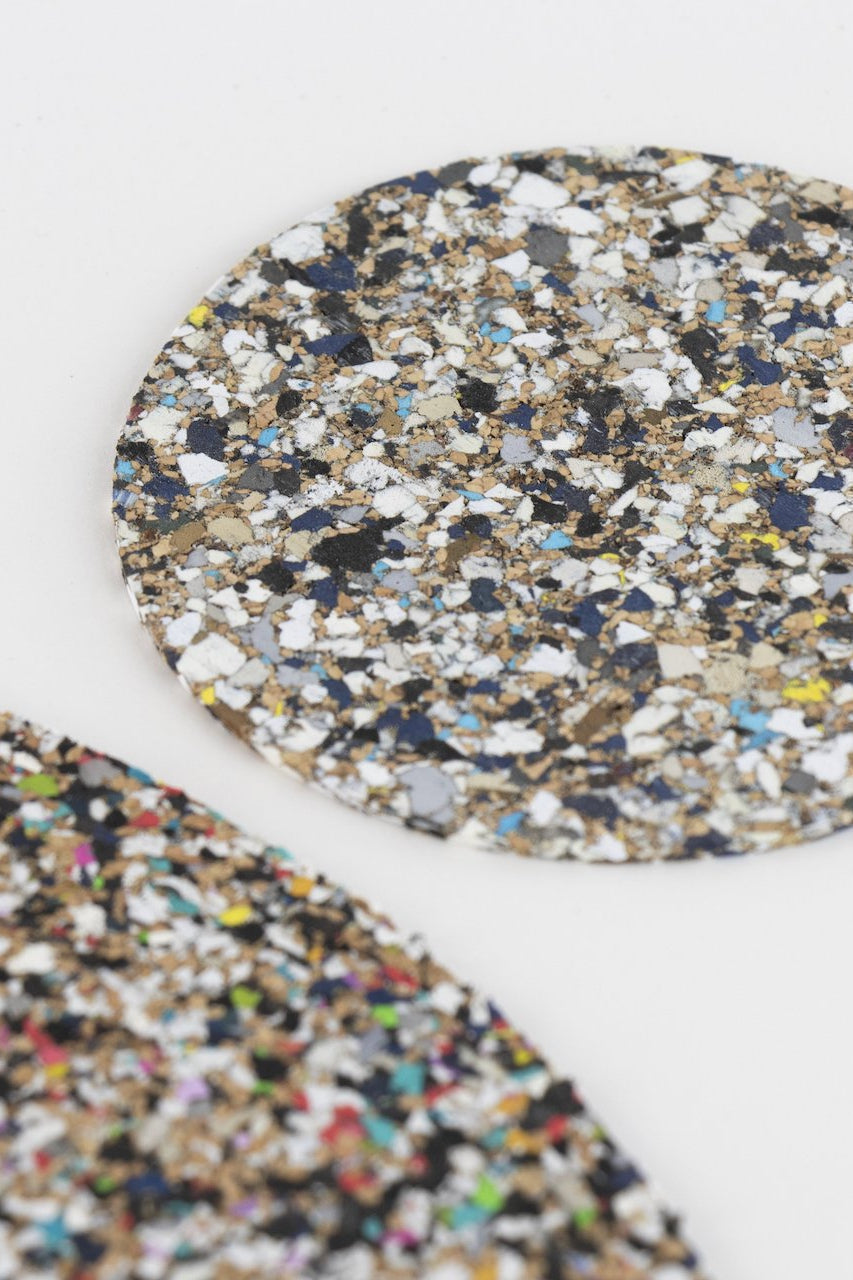 Detailed view of a Liga Beach Clean Round Coaster, highlighting the distinctive patterns created from recycled materials.