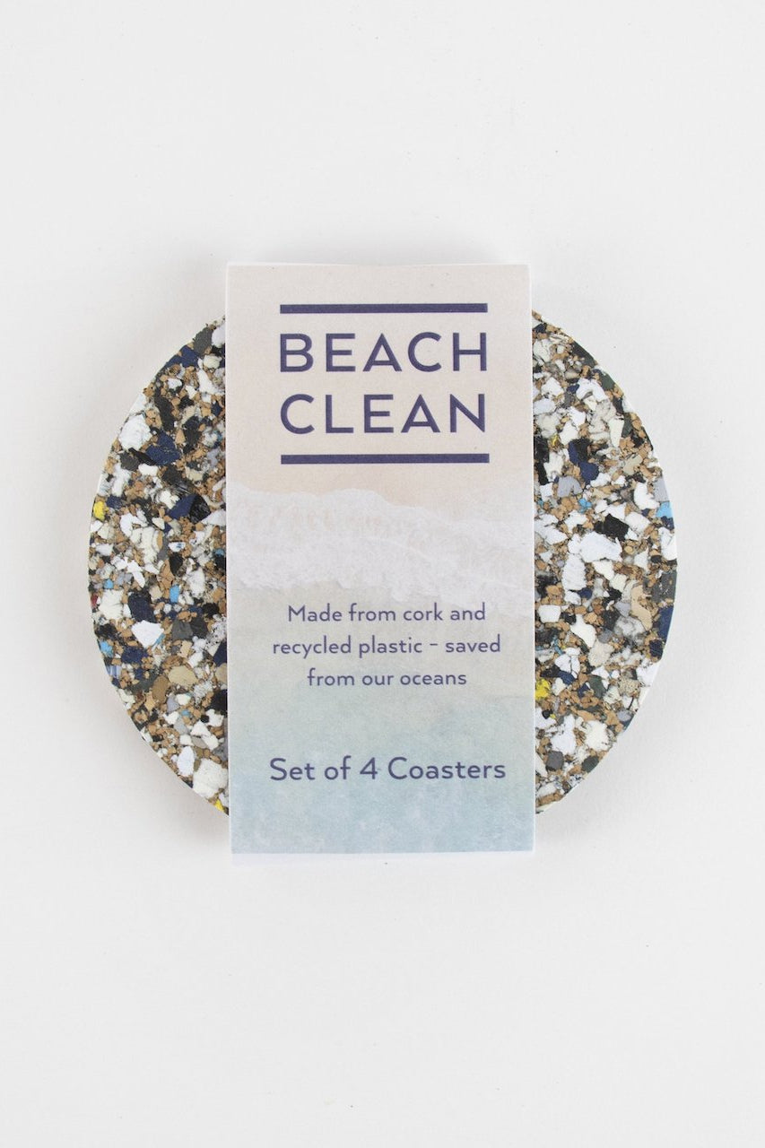 Set of four Liga Beach Clean Round Coasters in beach design packaging.