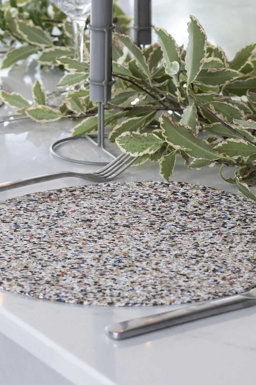 Set of four Liga Beach Clean Round Placemats, each featuring unique patterns made from recycled EVA plastics and eco-friendly cork.