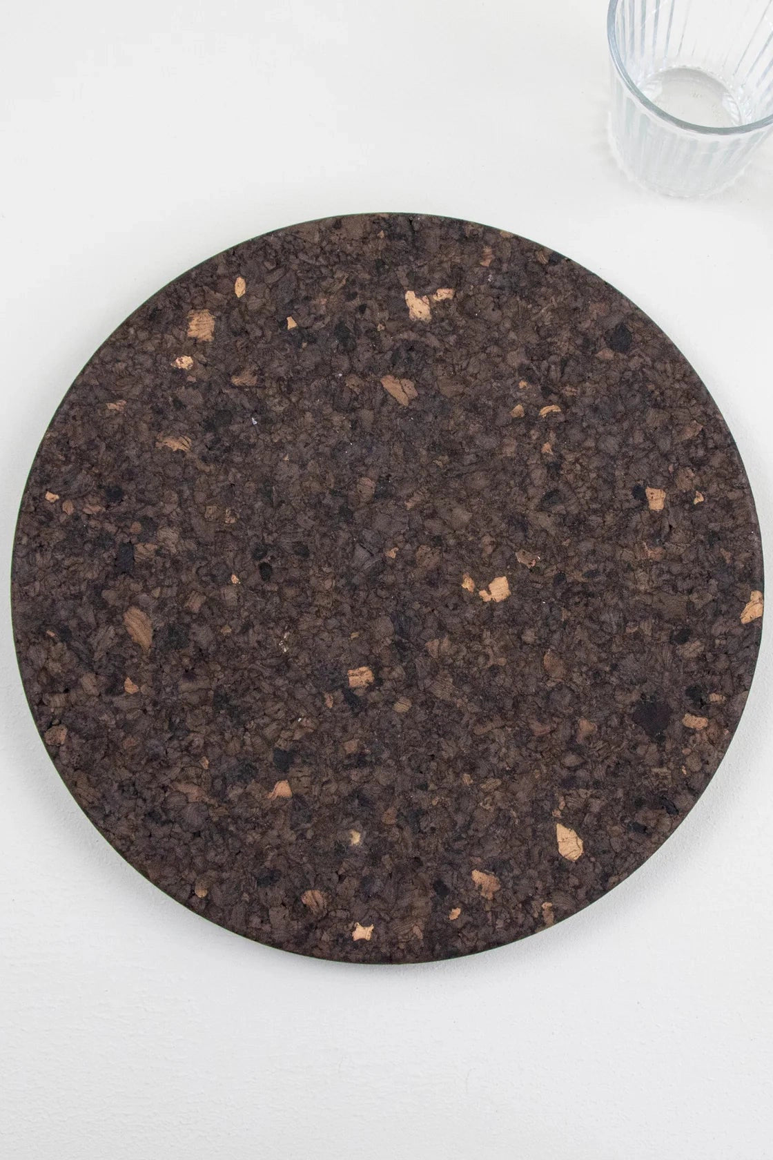 Top view of Large Liga Smoked Cork Trivet with a sleek, modern design featuring a unique smoked finish.